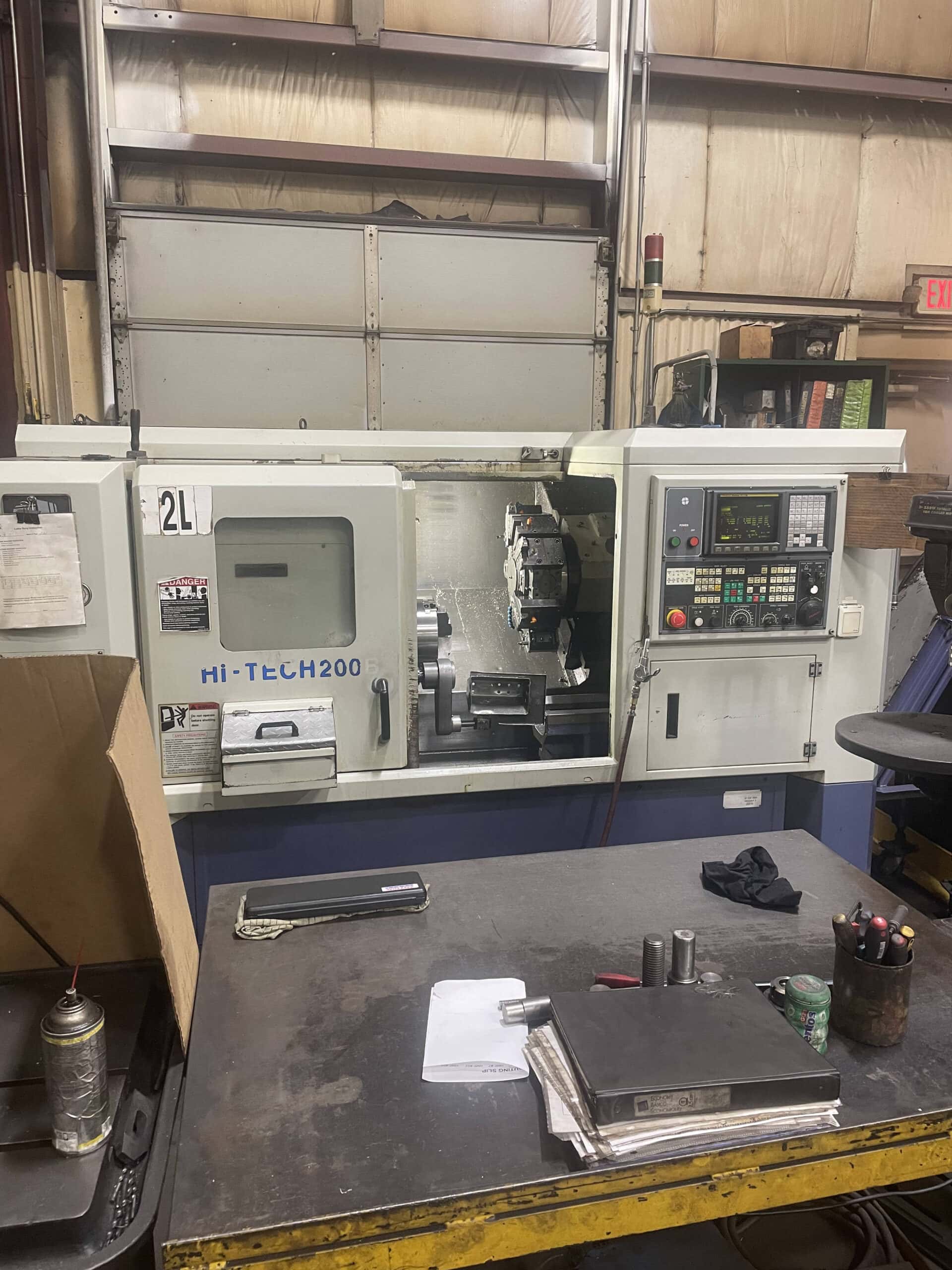 Hwacheon HI TECH 200B CNC Lathe, 2005 - Live Tooling, Fanuc Control, Bar Feeder