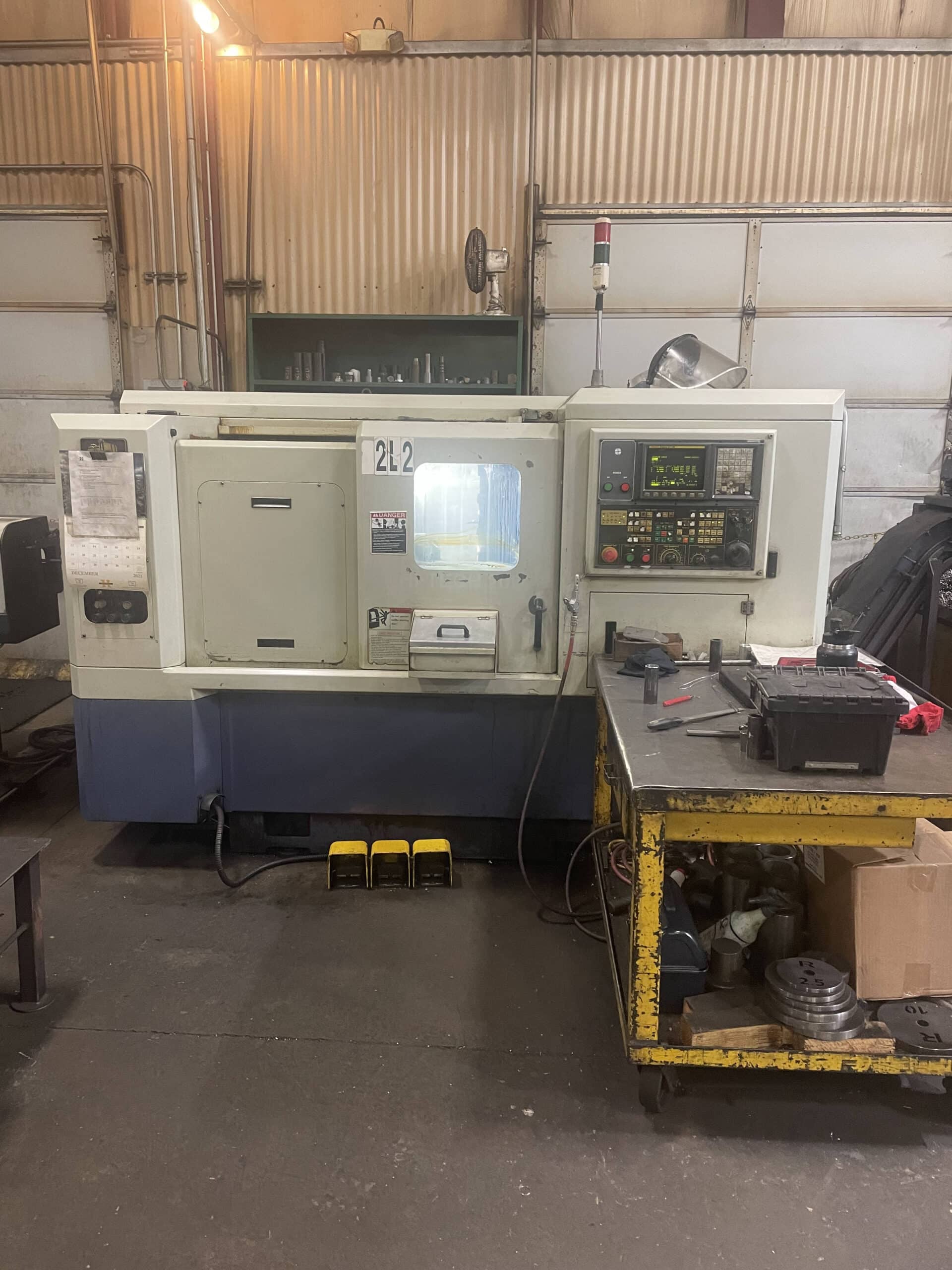 Hwacheon HI TECH 200B CNC Lathe, 2004 - Live Tooling, Fanuc Control, Bar Feeder