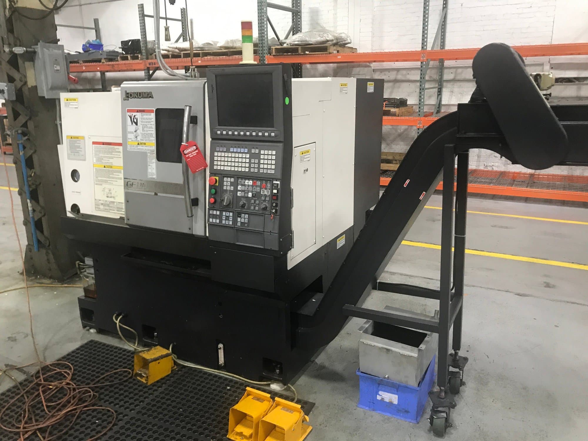 Okuma Genos L250 CNC Lathe, 2014 - Chip Conveyor, Tailstock