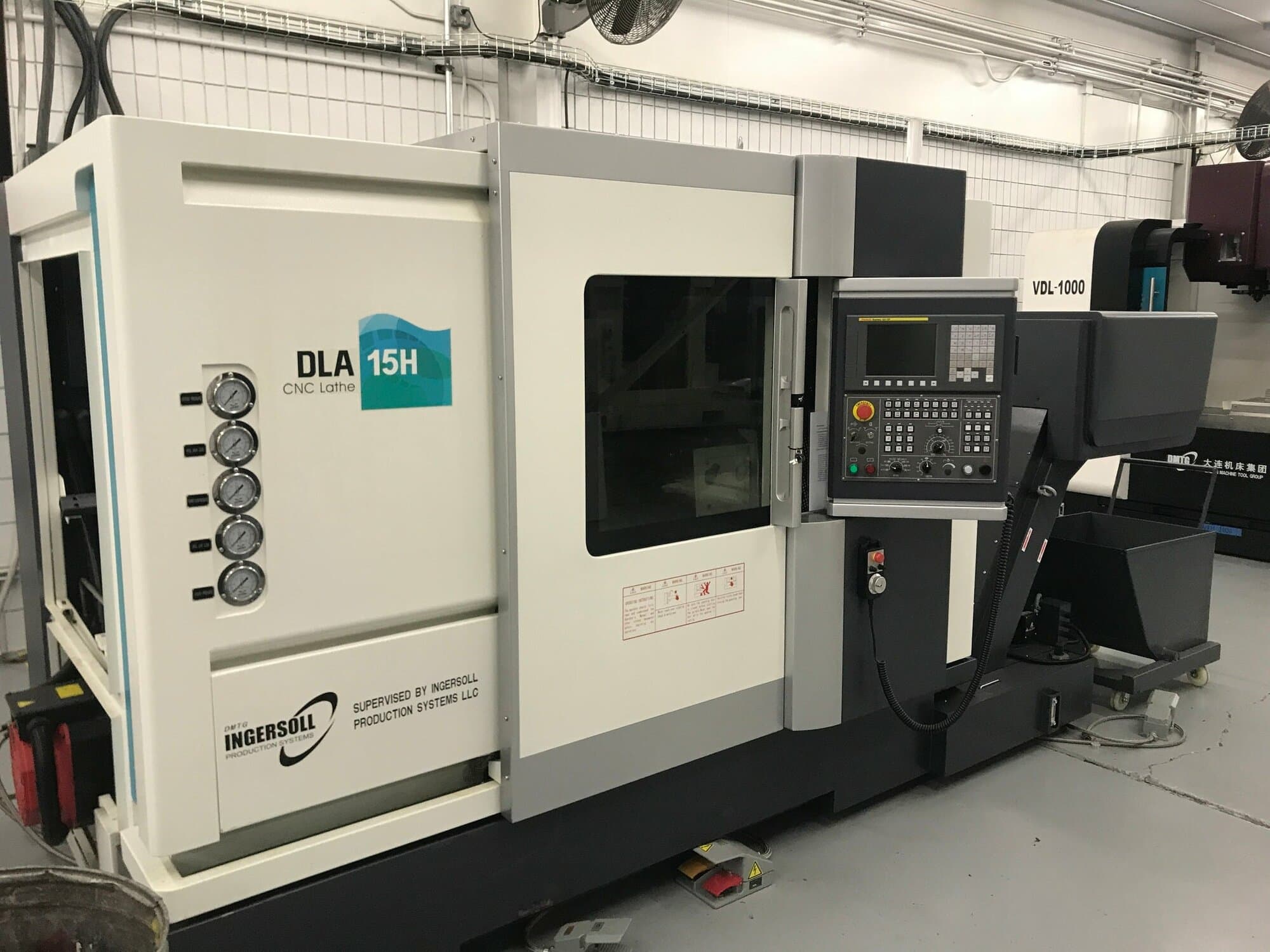 DMTG DLA 15H Slant Bed CNC Lathe, 2016 - Fanuc oi-TF control, Tailstock, Chip Conveyor, Live Tooling