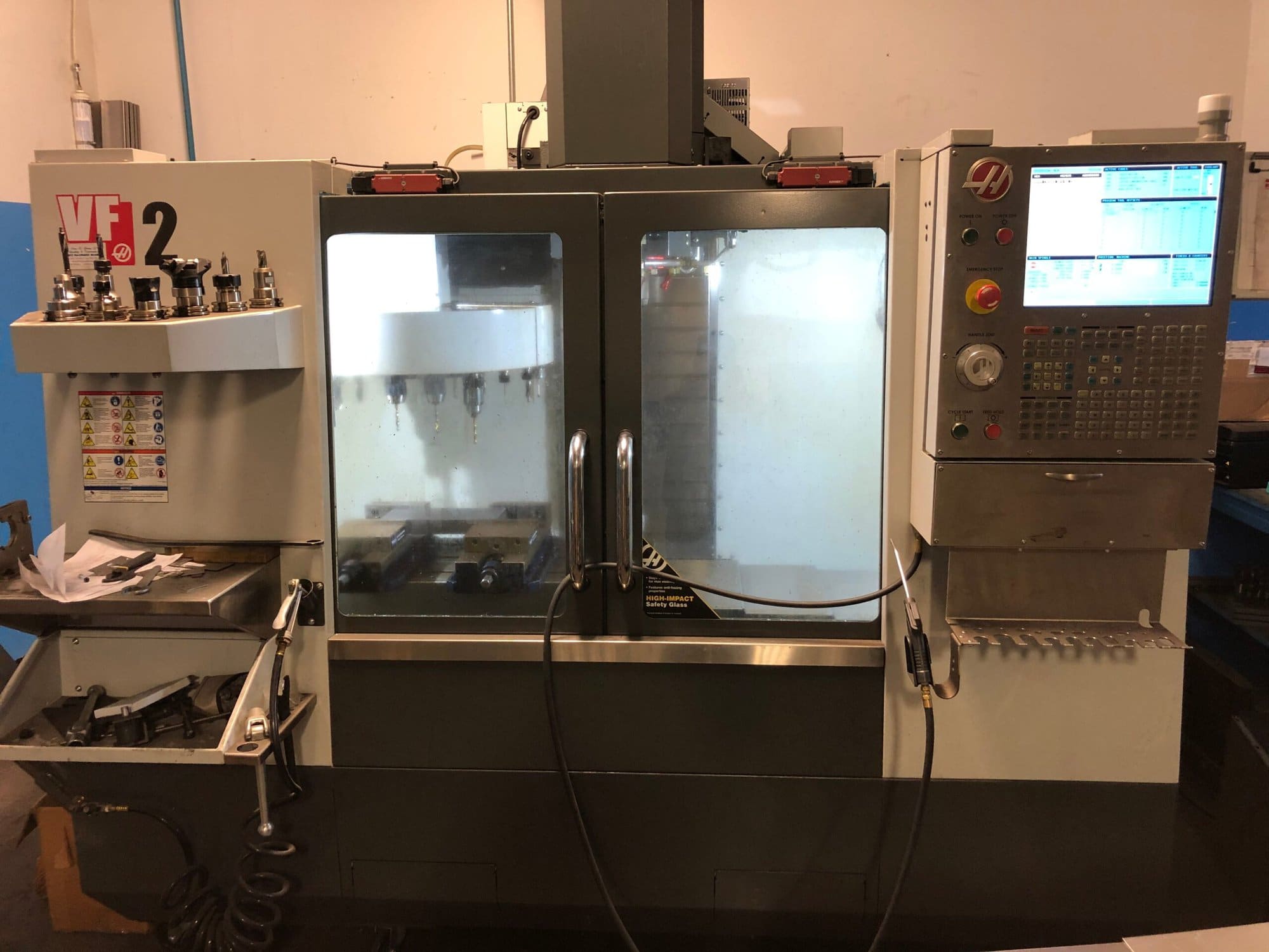 Haas VF-2 VMC, 2015 - WIPS, Under Power, Tooling Included, Video