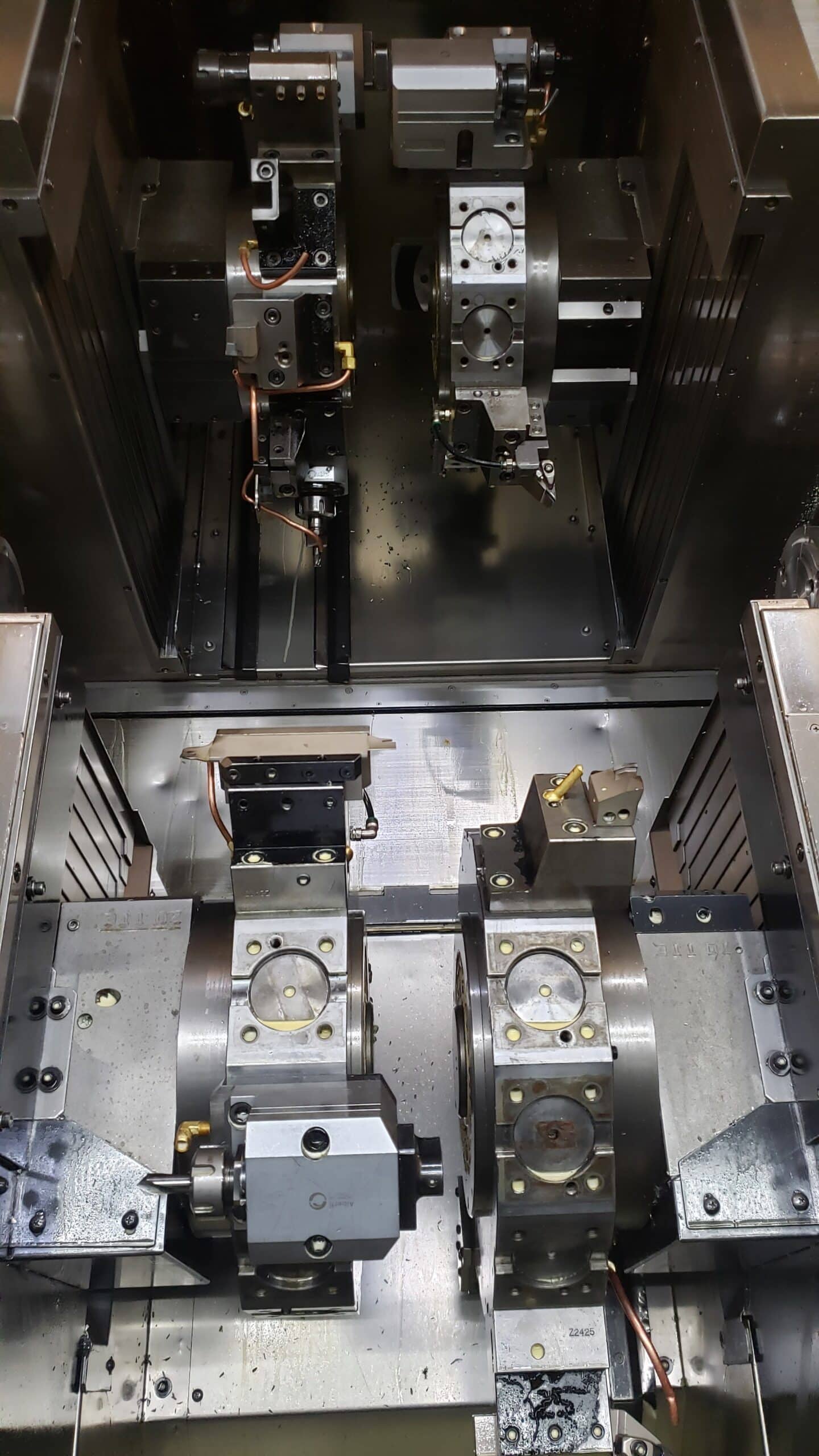 NAKAMURA-TOME WTW-150 CNC Turning Center, 2003 - 4 Turrets, Live Tooling, Chip Conveyor, Under Power Making Precision Parts - Image 2