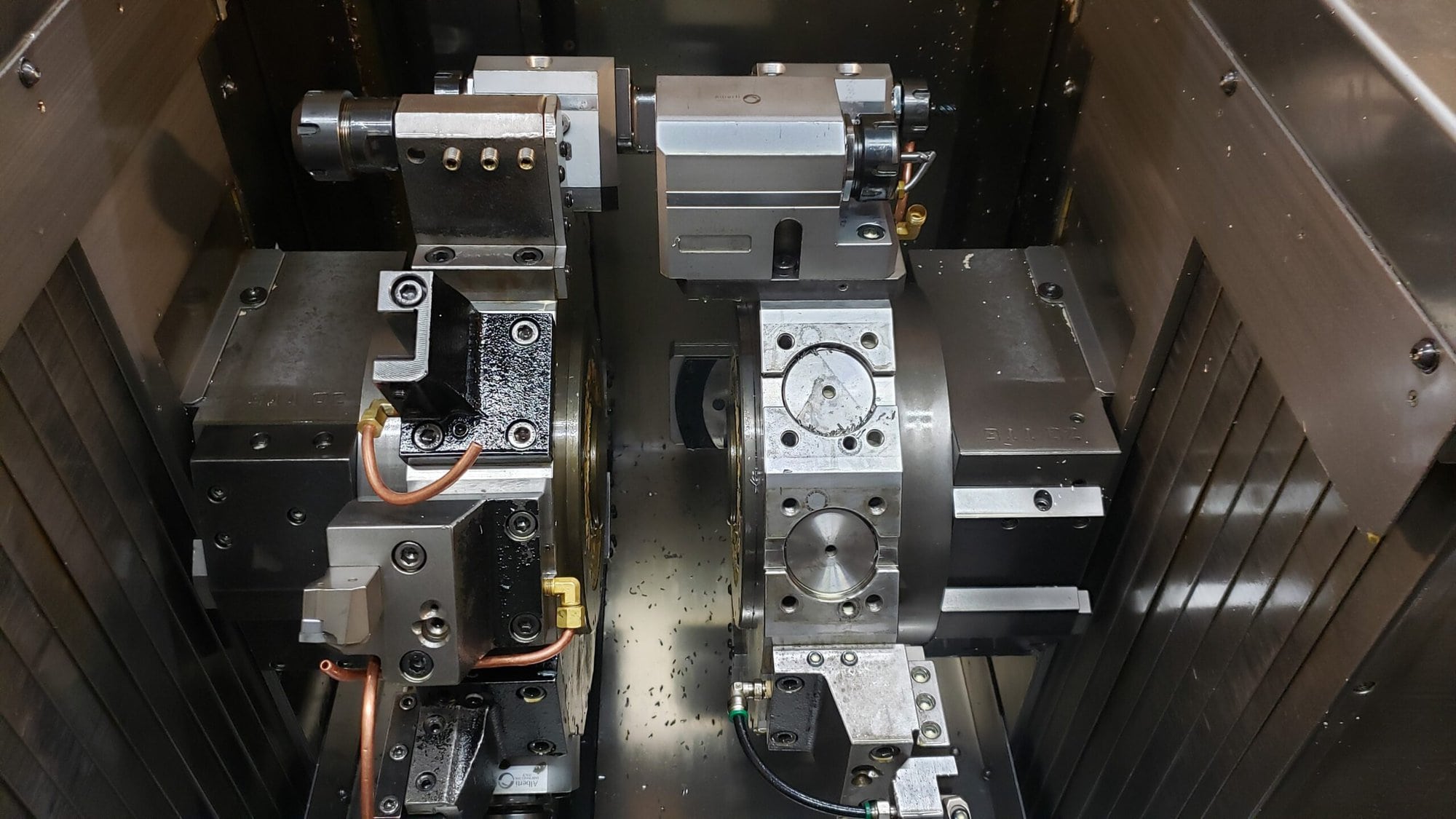NAKAMURA-TOME WTW-150 CNC Turning Center, 2003 - 4 Turrets, Live Tooling, Chip Conveyor, Under Power Making Precision Parts - Image 5
