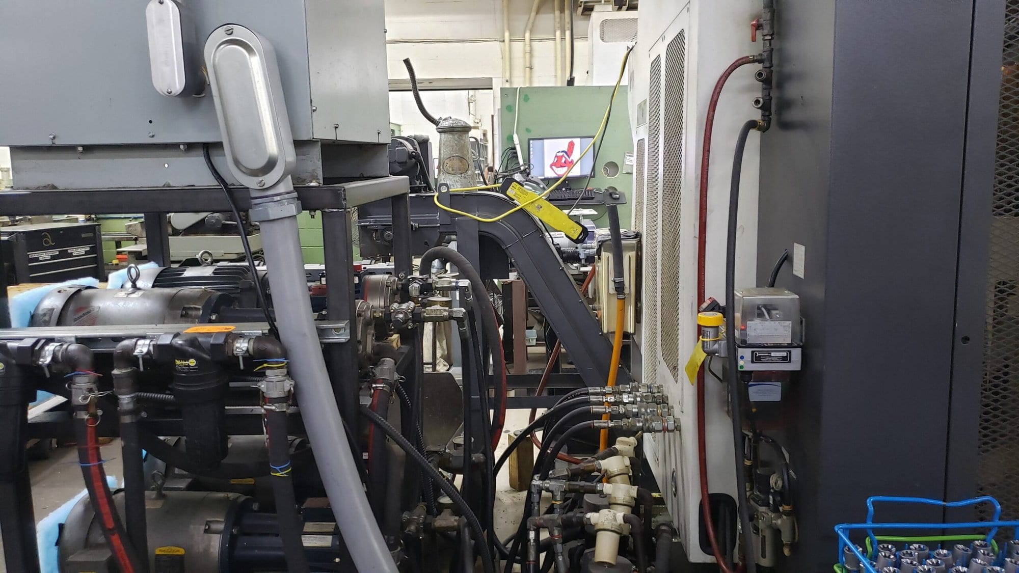NAKAMURA-TOME WTW-150 CNC Turning Center, 2003 - 4 Turrets, Live Tooling, Chip Conveyor, Under Power Making Precision Parts - Image 11