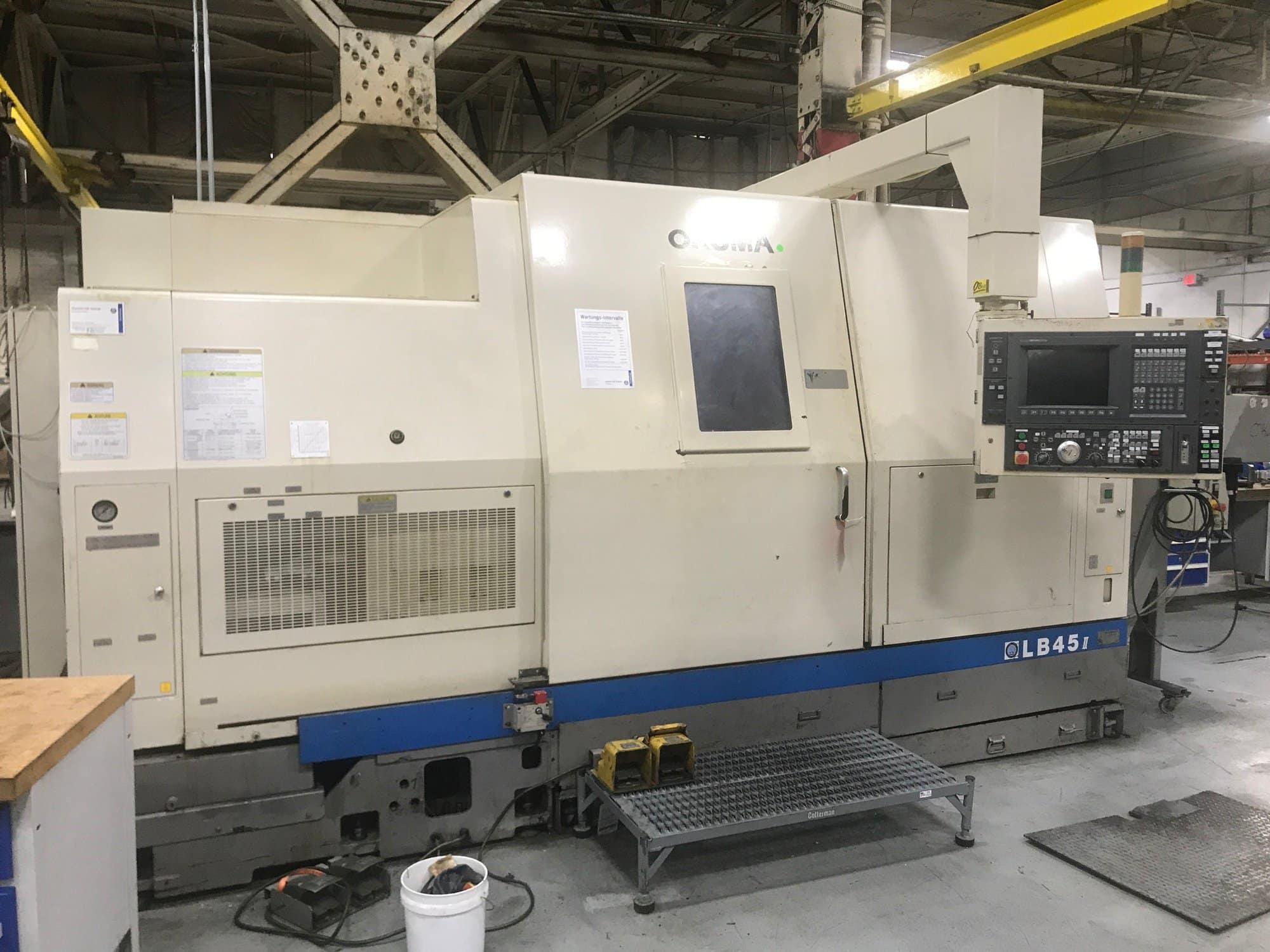 Okuma LB45-II CNC Lathe, 1998 - Tailstock, Chip Conveyor