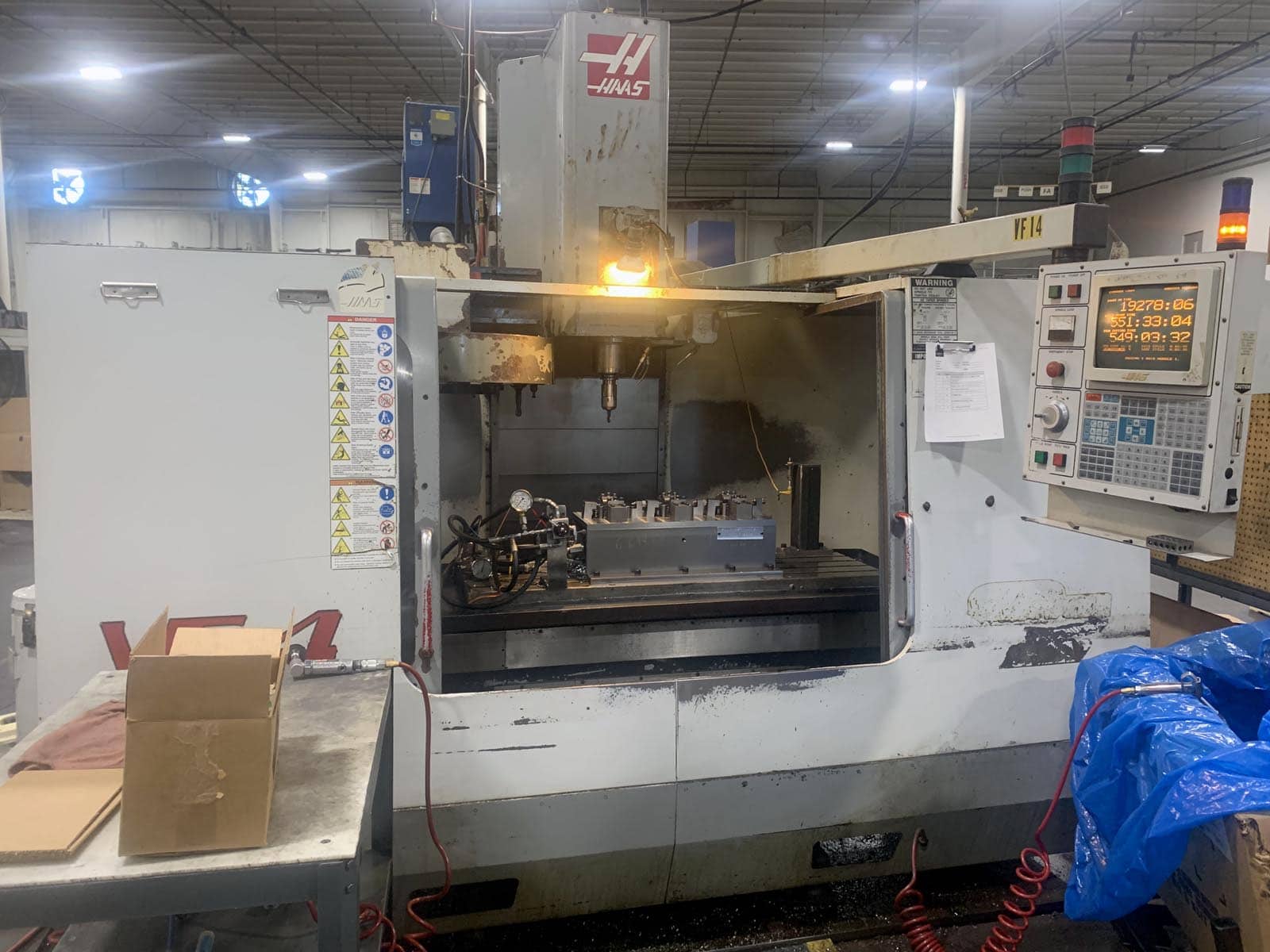 Haas VF-4 Vertical Machining Center, 1999- TSC, 10k Spindle, Auger