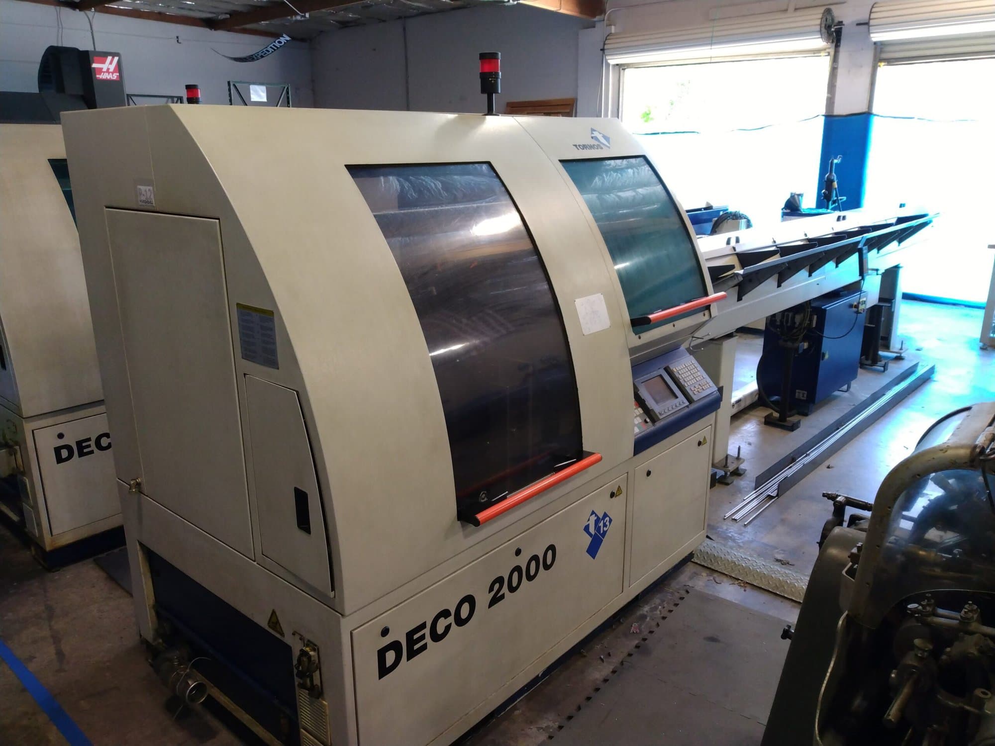 Tornos Deco 13 Swiss Lathe, 2002 -12-Axis, Live Tooling, Bar Feeder, Tons of Options
