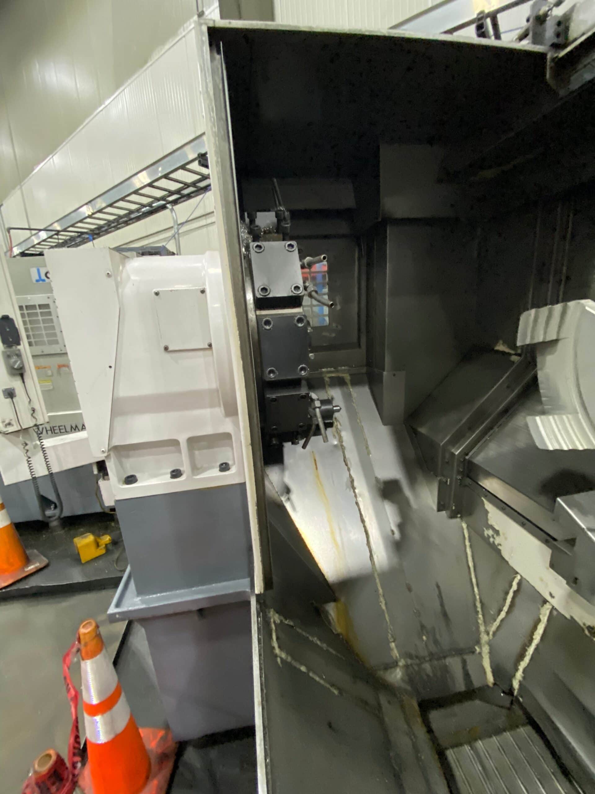 Okuma LAW-FII(L) CNC Wheel Lathe, 2011 - Video, Under Power - Image 11