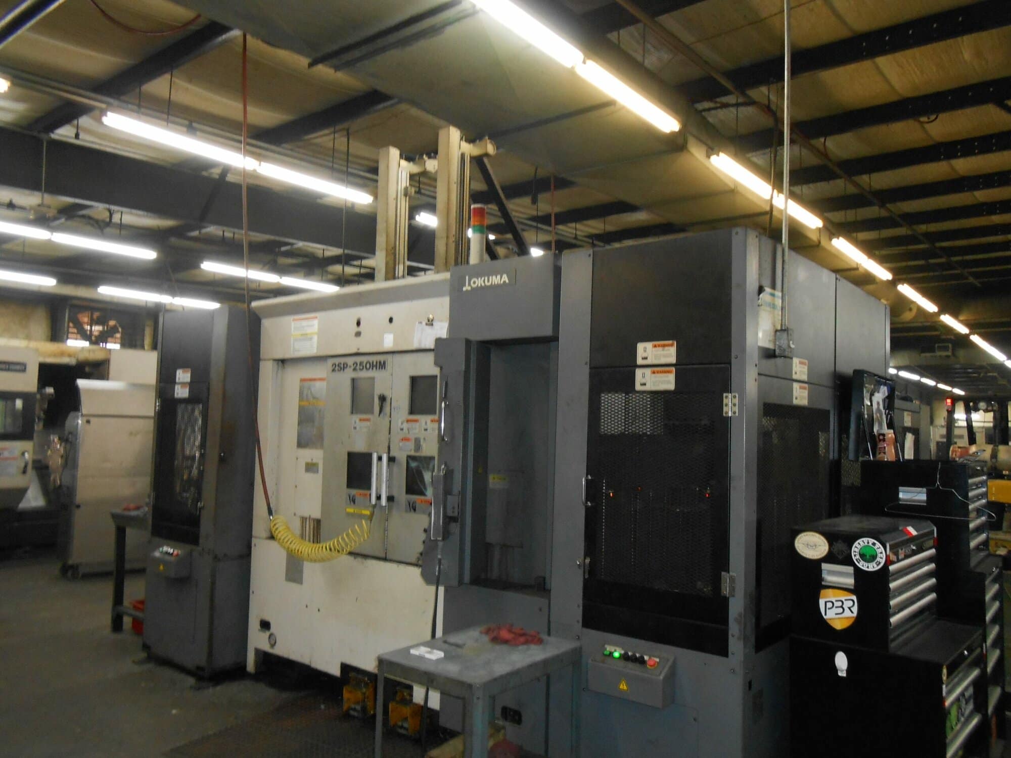 Okuma 2SP-250HM CNC Lathe, 2012- Chip Conveyor, Gantry Loader