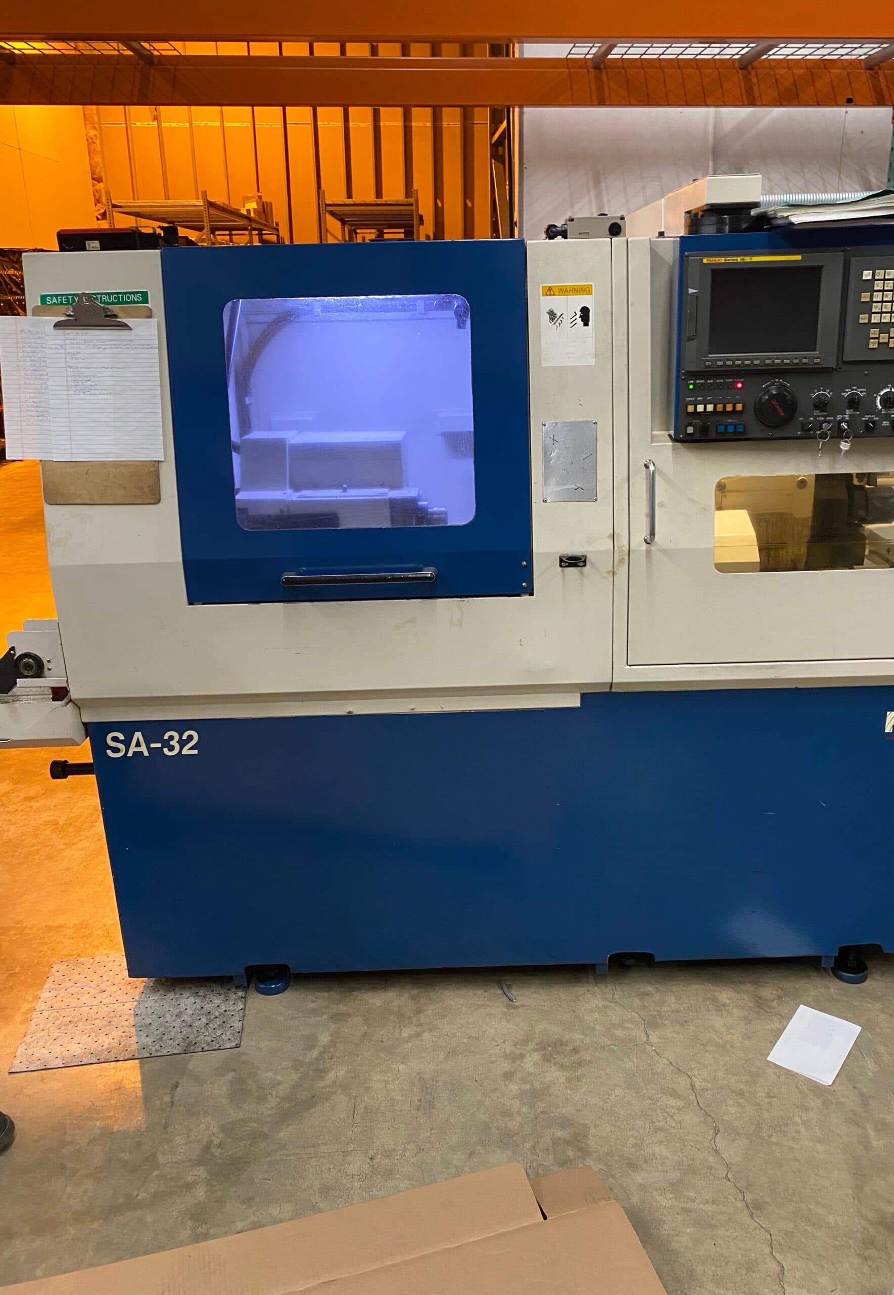 Nexturn SA-32 Swiss CNC Lathe, 2003 - Iemca Boss Bar Feeder, Chip Conveyor