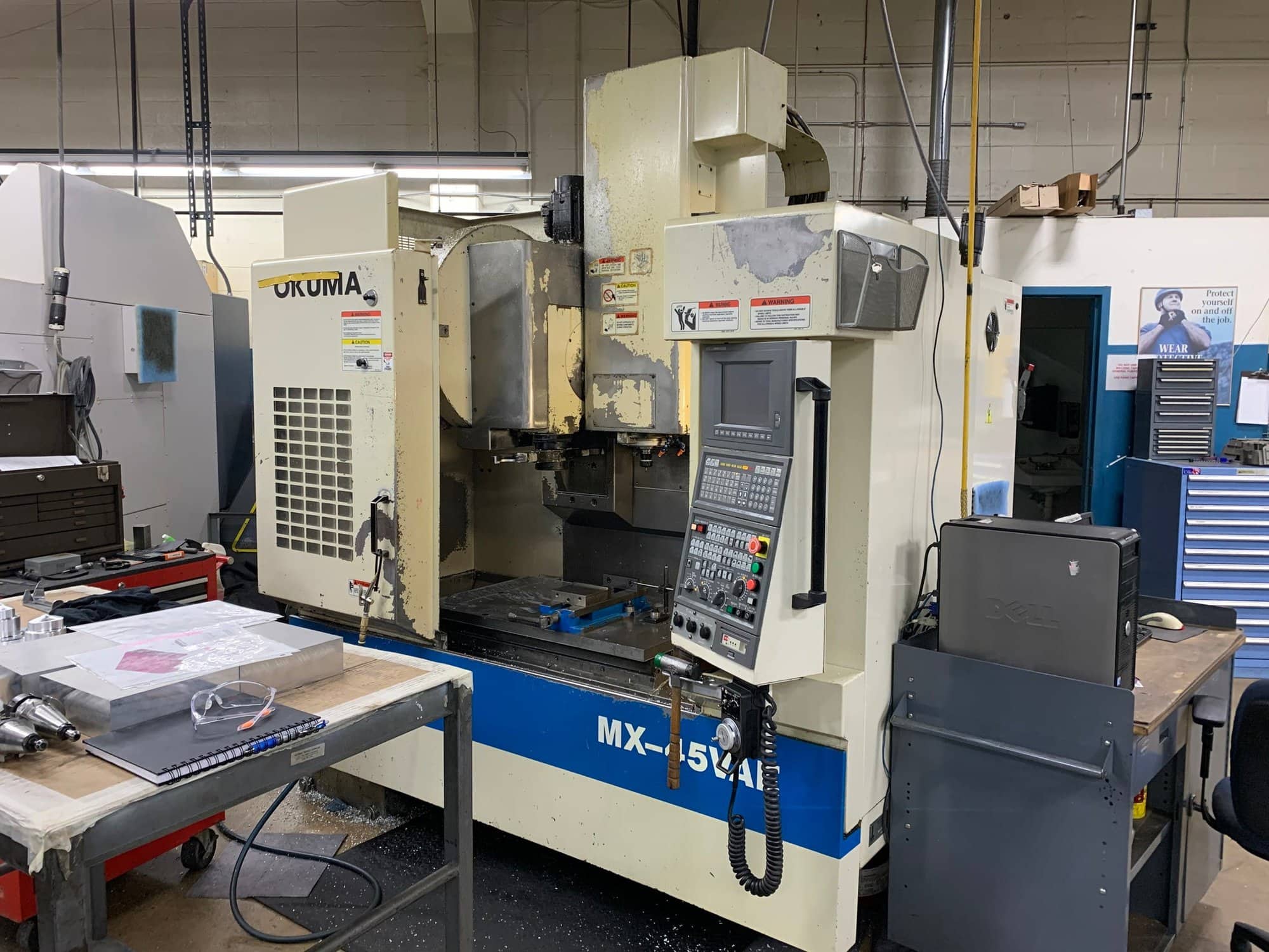 Okuma MX-45VAE Vertical Machining Center, 1998 - Chip Conveyor, OSP7000M Control
