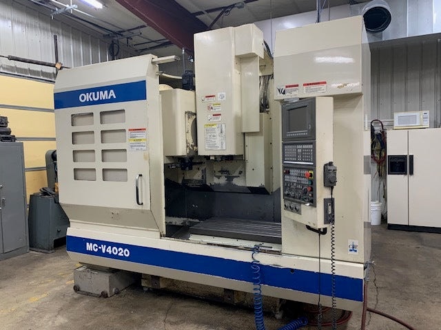 Okuma MC-V4020 VMC, 2001 - Chip Conveyor