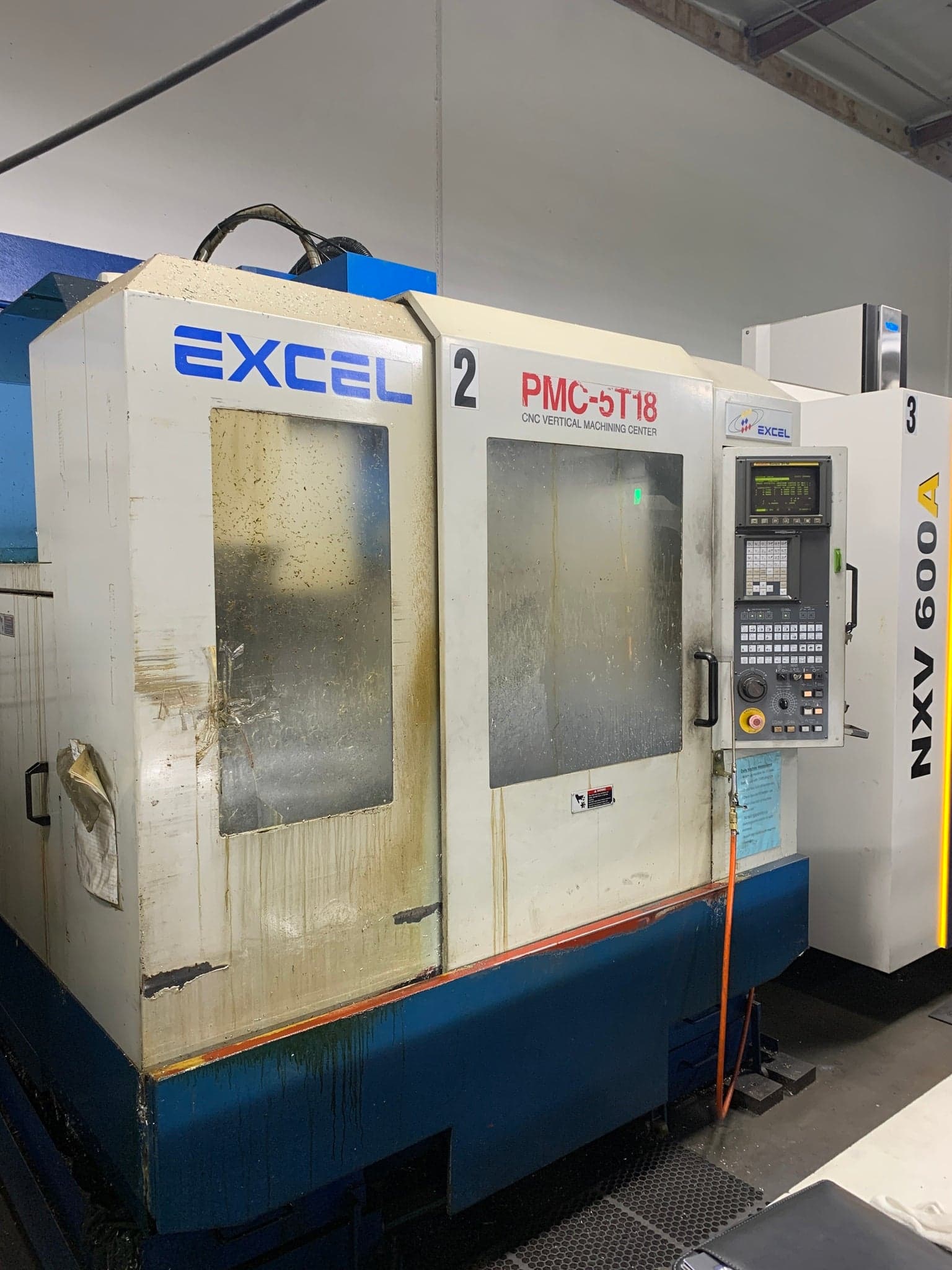 Excel PMC-5T18 VMC, 1999 - Rigid Tap, Fanuc 21M, 18 SMTC, 2 Available