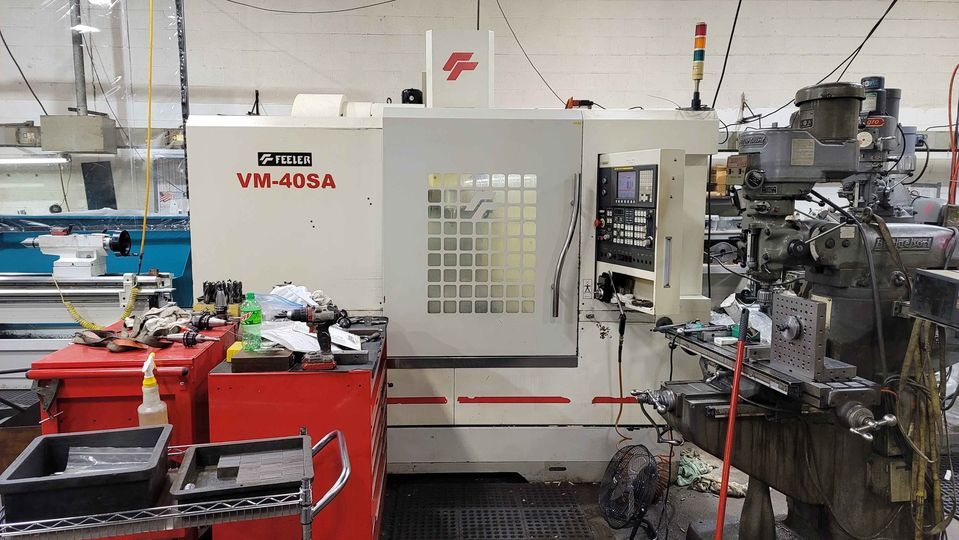 Feeler VM-40SA VMC, 2006 - Chip Auger, Fanuc Control