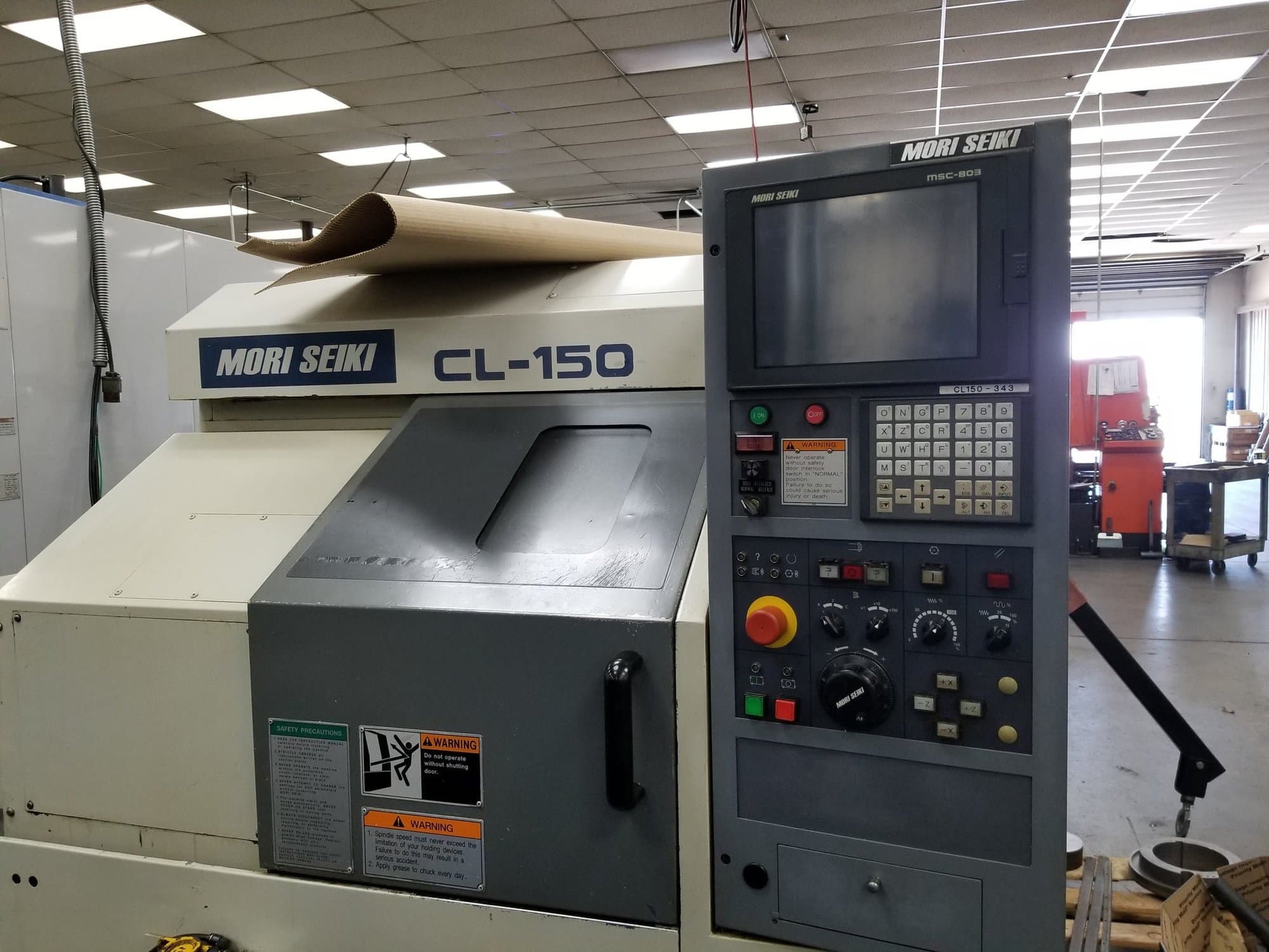 Mori Seiki CL-150 CNC Lathe, 1998 - Chip Conveyor, Tool Presetter, Part Catcher, Under power for inspection