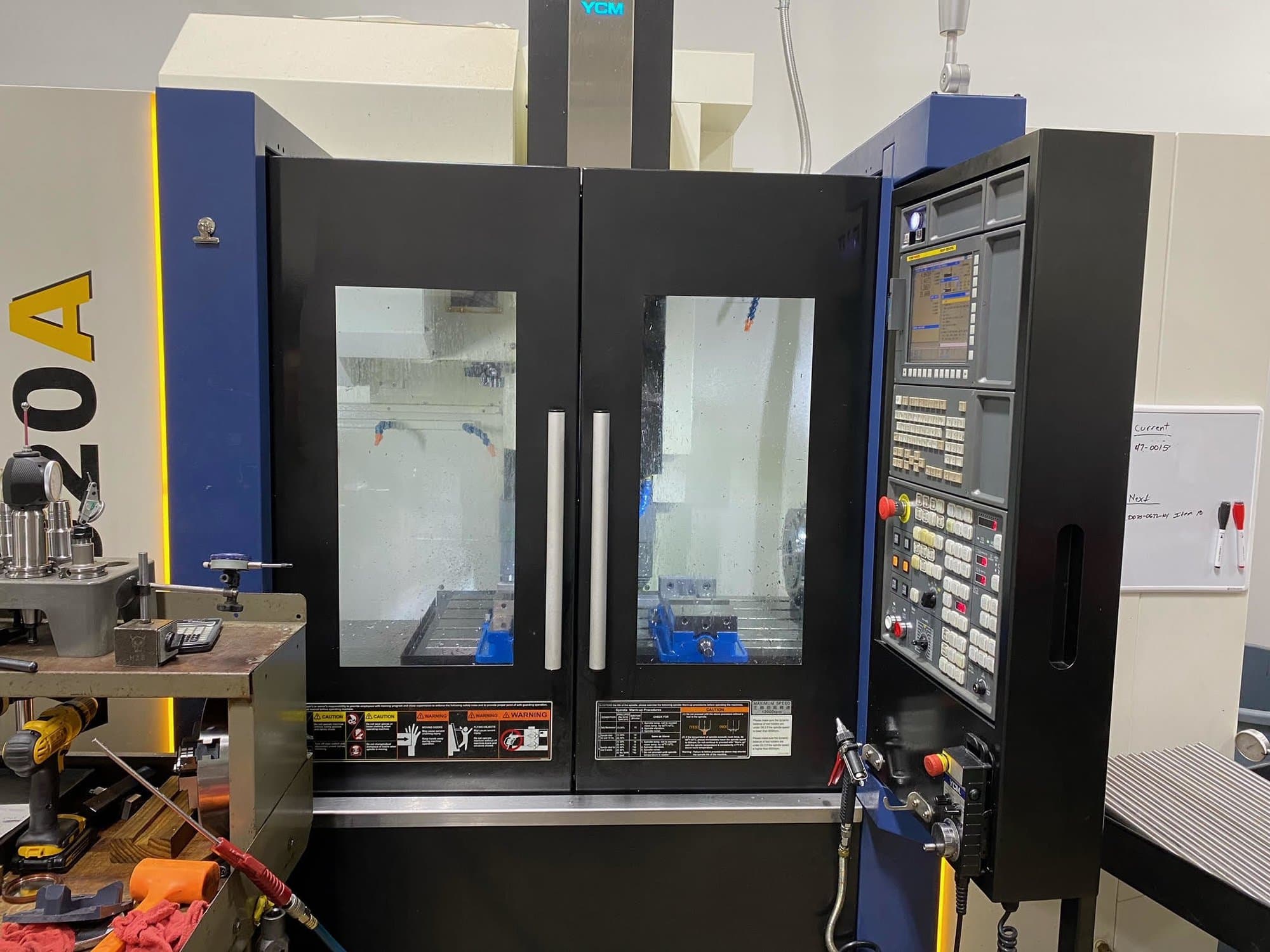 YCM NXV 1020A VMC, 2017- 4th Axis, Renishaw Probe, Fanuc, Low Hours