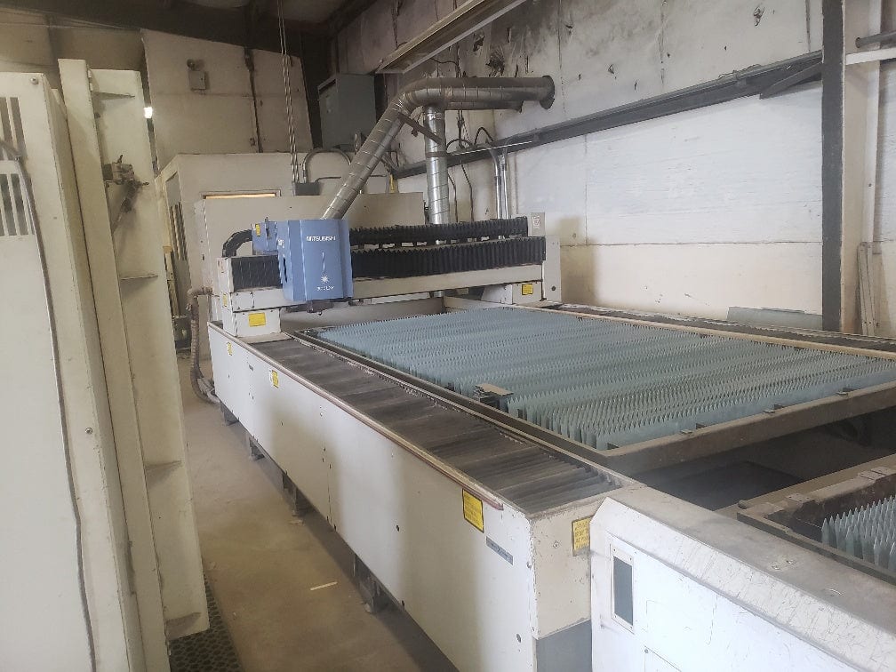 Mitsubishi 3015 LXP Laser, 1998- With Shuttle Tables