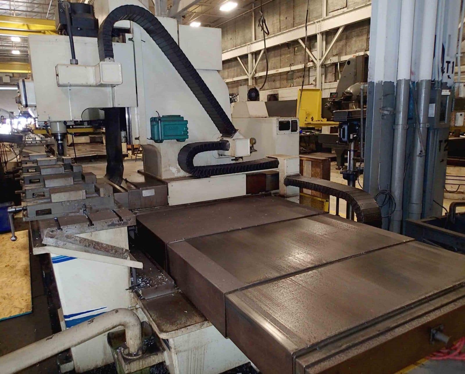 KOMO VMC 144 Fixed Table Mill, 1991- 144” x 20”, Fanuc Control - Image 4