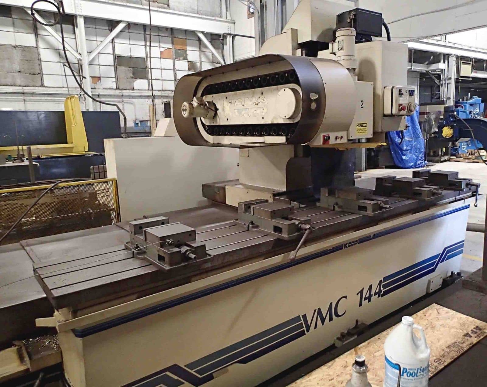 KOMO VMC 144 Fixed Table Mill, 1991- 144” x 20”, Fanuc Control