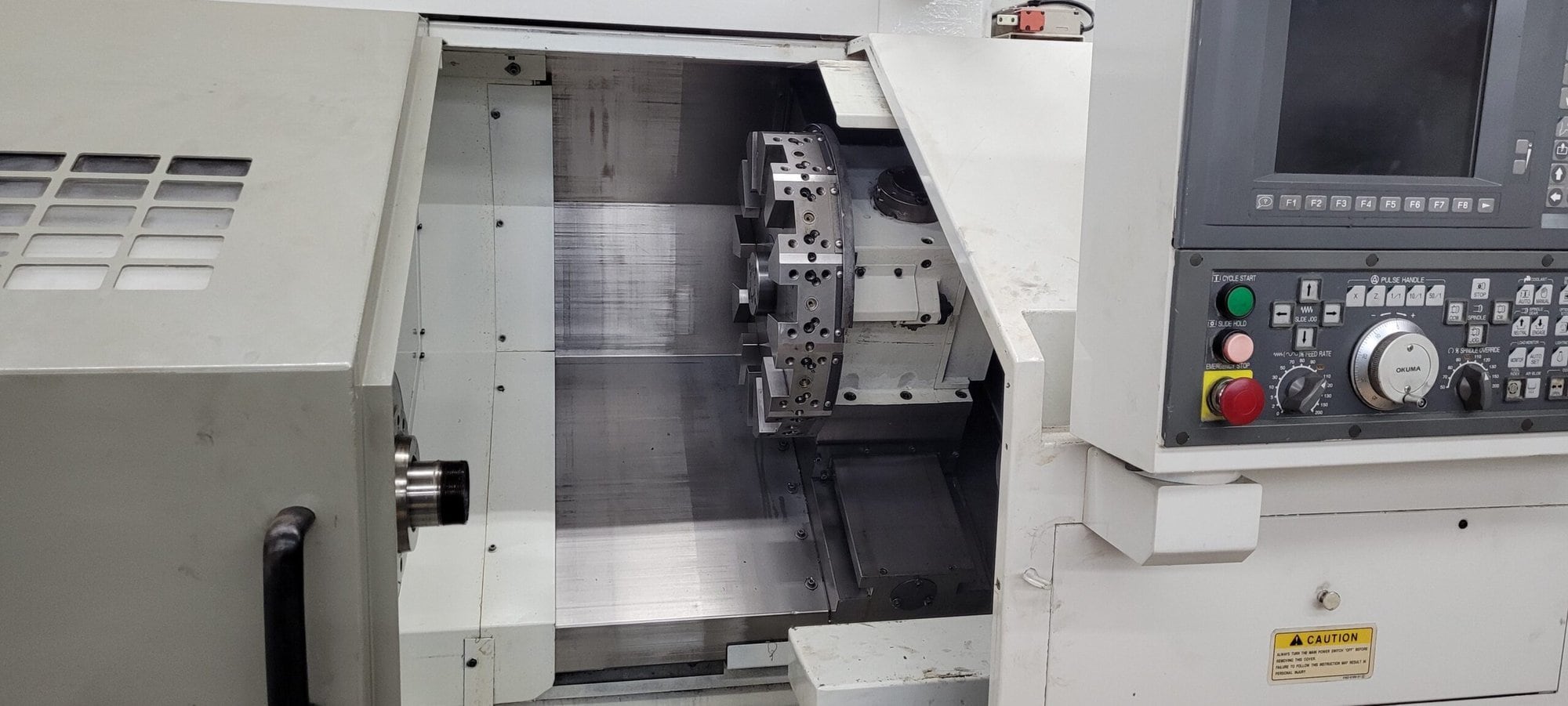 Okuma ES-L10 CNC Lathe, 2004 - 12 Tool Turret, USB, Conveyor, Tailstock - Image 2