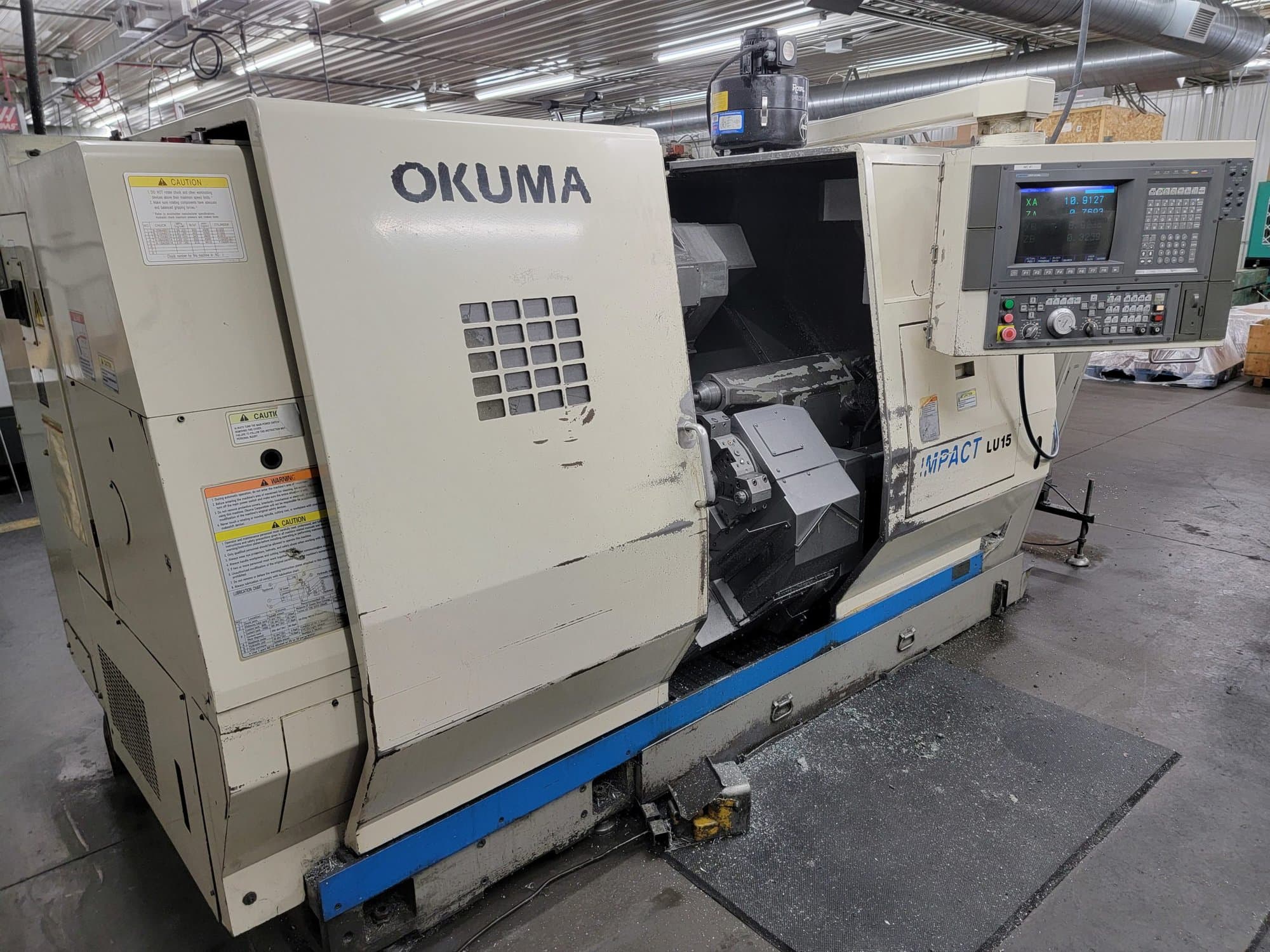 Okuma LU15 CNC Lathe, 2000 – Dual Turrets, Tooling Included, Chip Conveyor - Image 3
