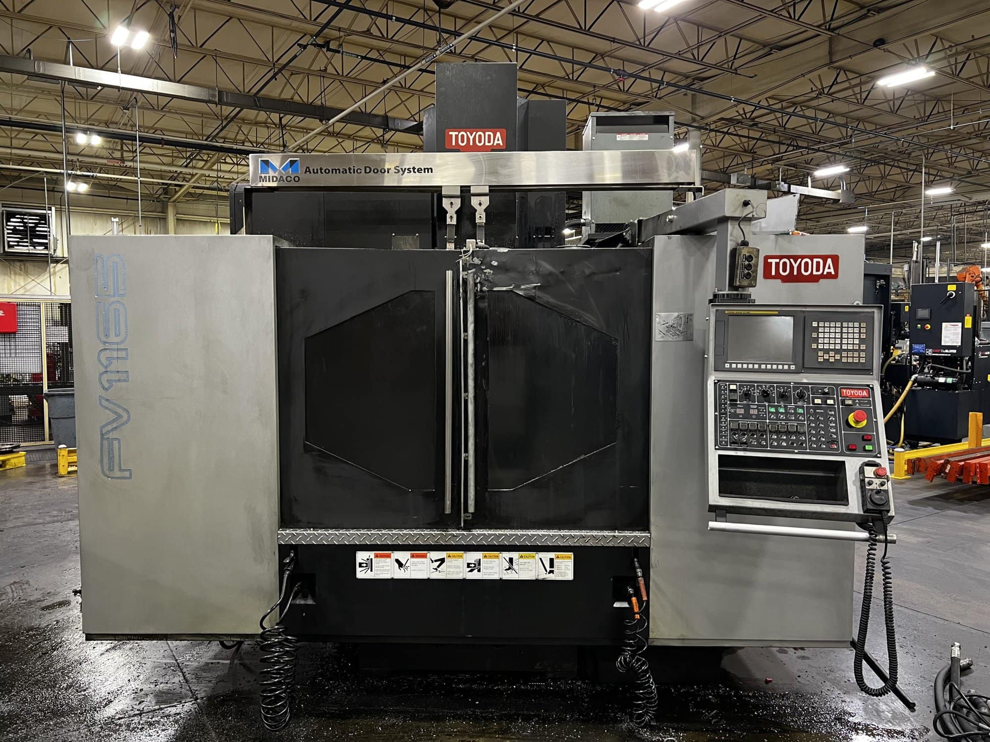 Toyoda FV1165 VMC, 2014 - 1000psi TSC , Auto Door System, Fanuc Control, Renishaw Probe