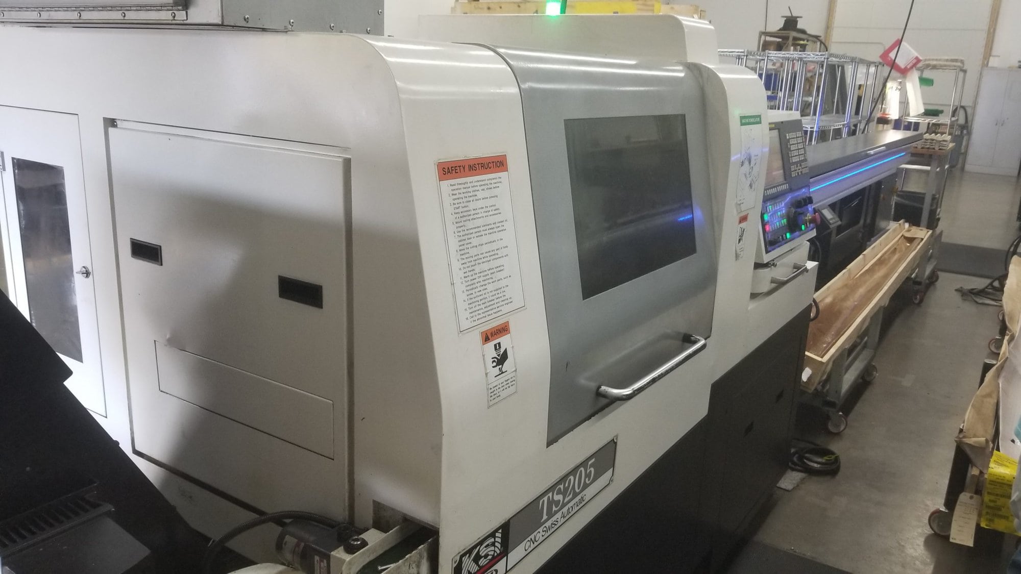 KSI TS 205 CNC Swiss Lathe, 2015 - High Pressure Coolant, BWG Barloader, Sub Spindle, Mist Collector