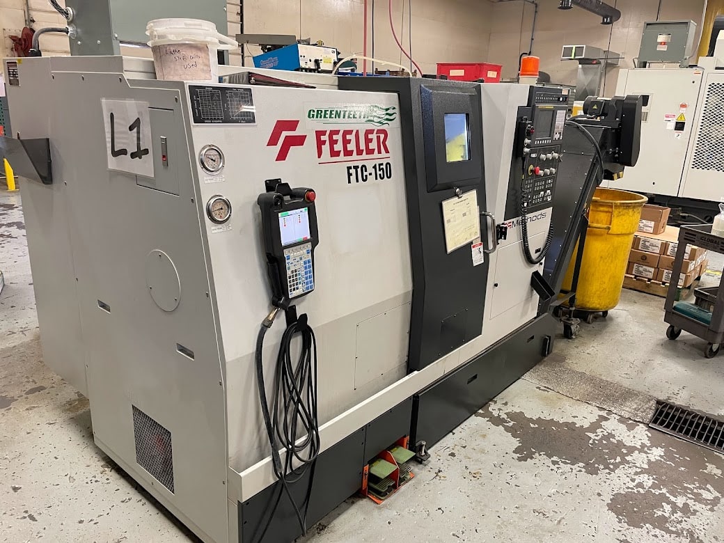Feeler FTC-150 CNC Lathe, 2011- Fanuc Robot Loader, Chip Conveyor