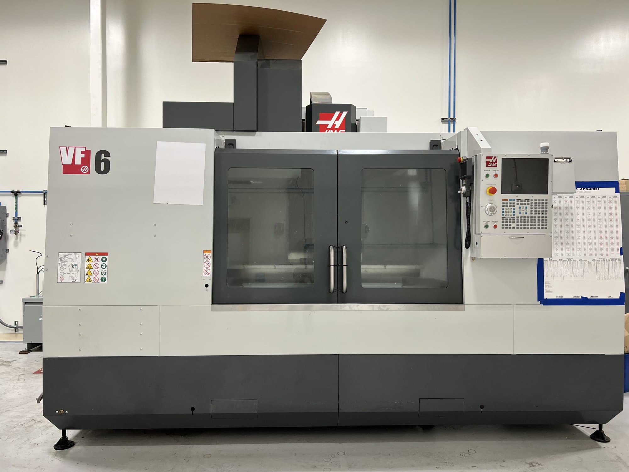 Haas VF-6 VMC, 2021 - Tooling Included, Fixture Plate, Next Gen Control, Chip Auger, Low Hours