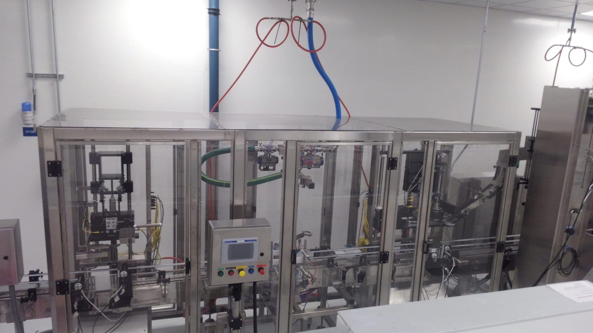 Oden ANW1-25-ID Liquid Packaging Line, 2019 - W/ Filler, Capper, and Labeler- *LATE MODEL, 5 HOURS RUNTIME*