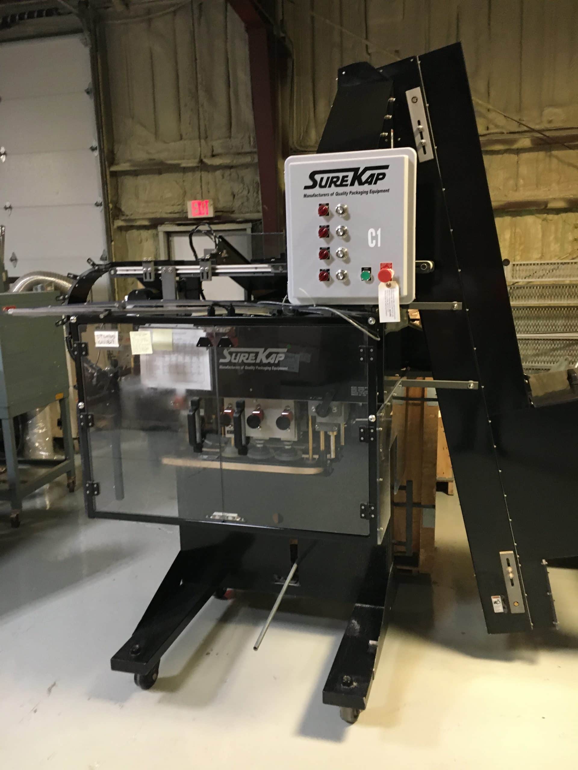 Sur Kap SK6000-BF6 Capper, 2014 - Conveyor Elevator