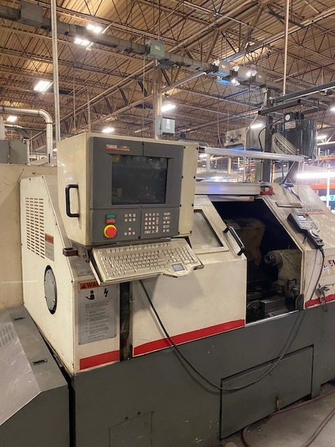 Cincinnati Milacron Avenger 250T CNC Lathe, 1997 - Chip Conveyor