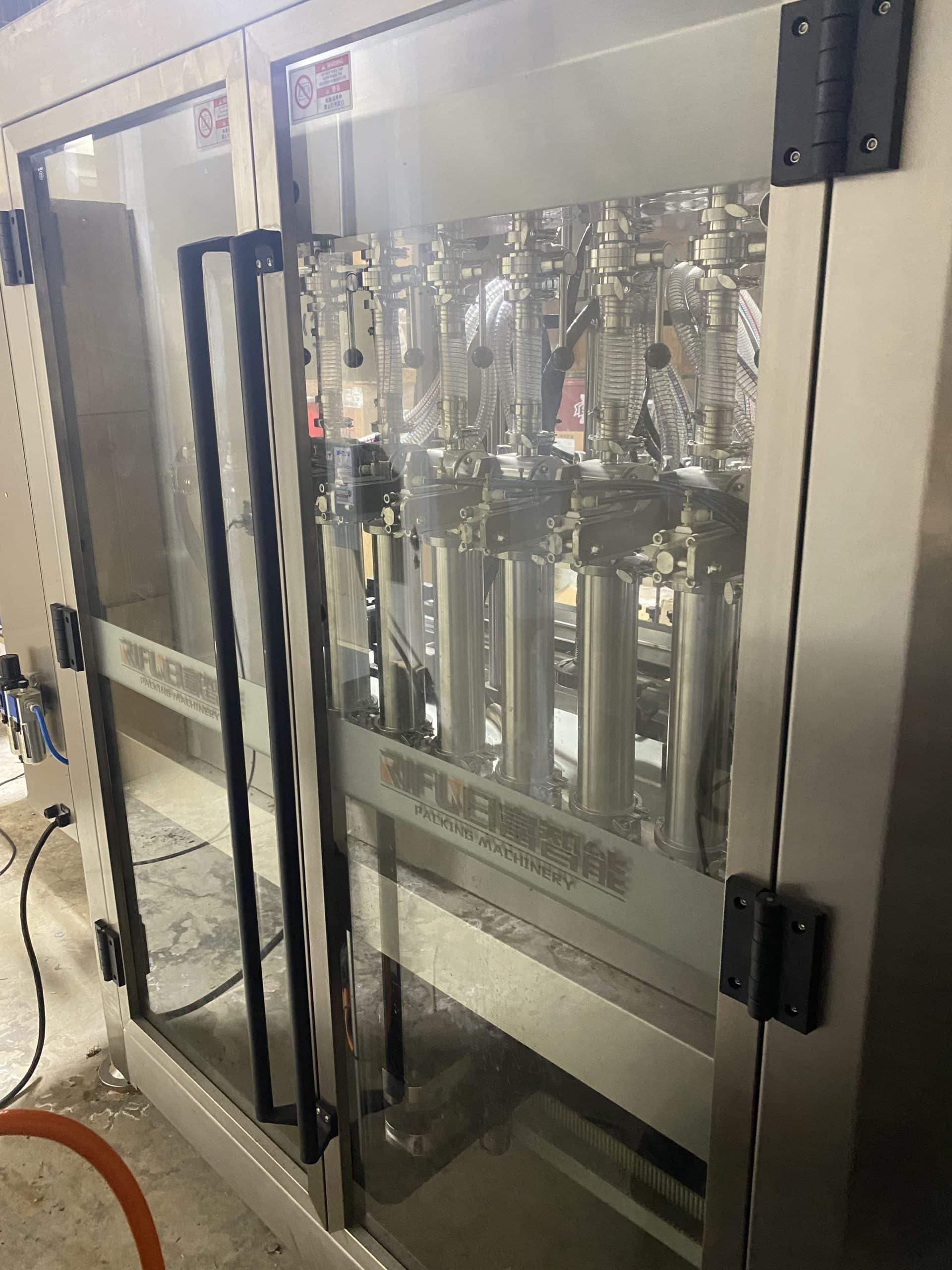 Liquid filling line - 8 head piston filler - Automatic capping machine - Automatic labeling machine - Image 2