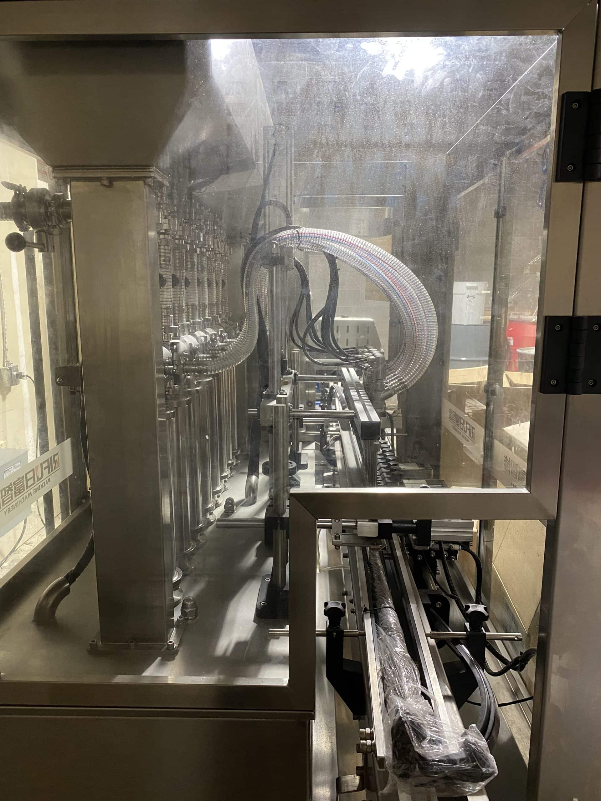 Liquid filling line - 8 head piston filler - Automatic capping machine - Automatic labeling machine - Image 3