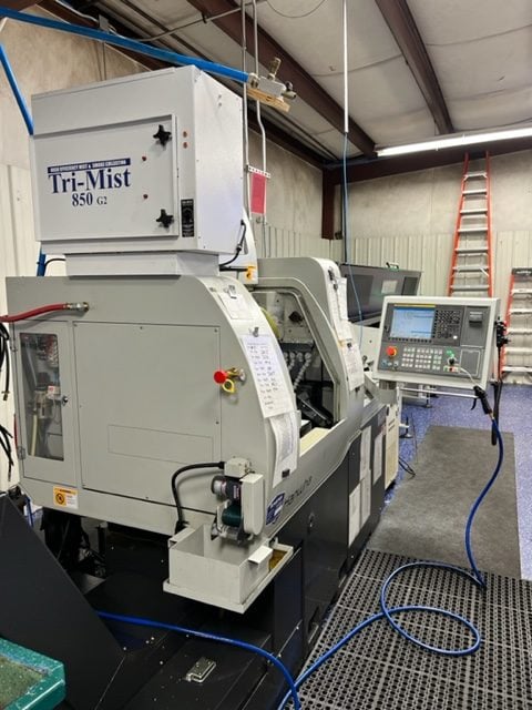 Hanwha XE35J 5 Axis CNC Swiss Lathe, 2019 - Fanuc Control, Bar Feeder, Tri Mist Collector