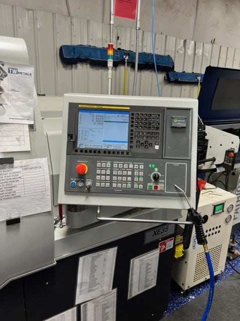 Hanwha XE35J 5 Axis CNC Swiss Lathe, 2019 - Fanuc Control, Bar Feeder, Tri Mist Collector - Image 4