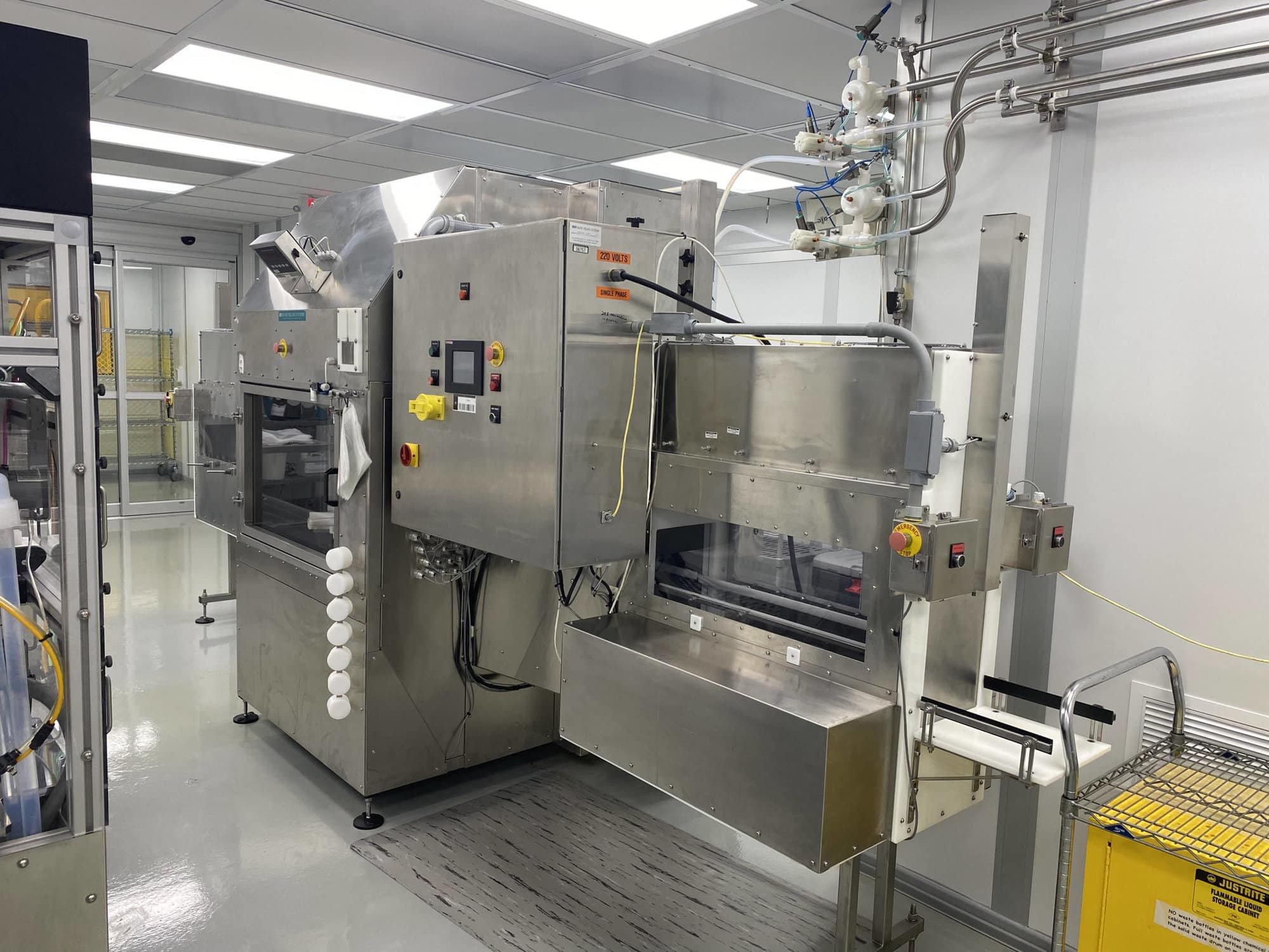 Inline Filling Systems Net-Weight Rotary Jar Filler with Integrated Capping for Clean Room Application in Semi-Conductor Industry, 2009
