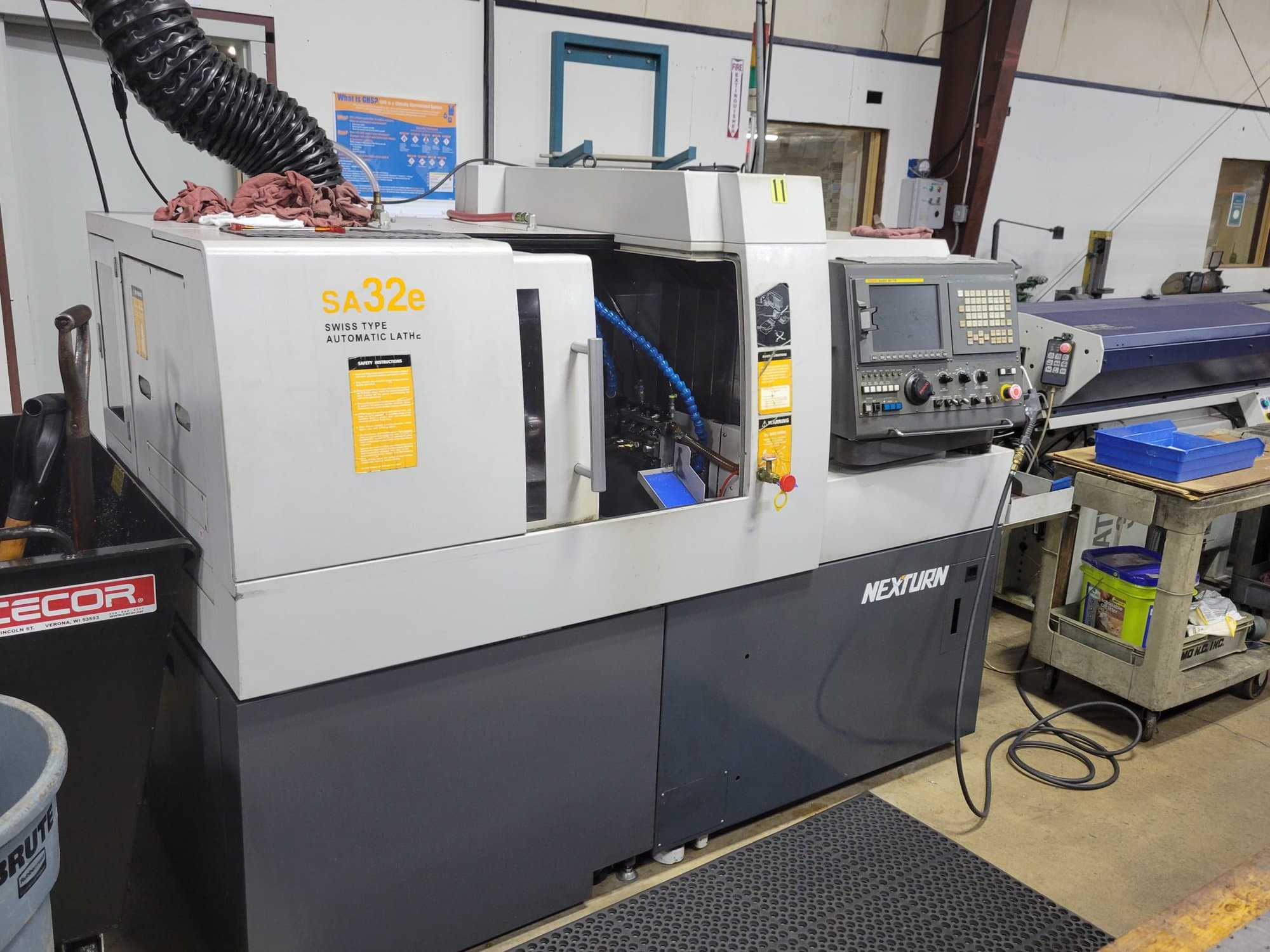 Nexturn SA32e CNC Swiss Lathe, 2008 - 7 Axis, Bar Feeder, Fanuc Control
