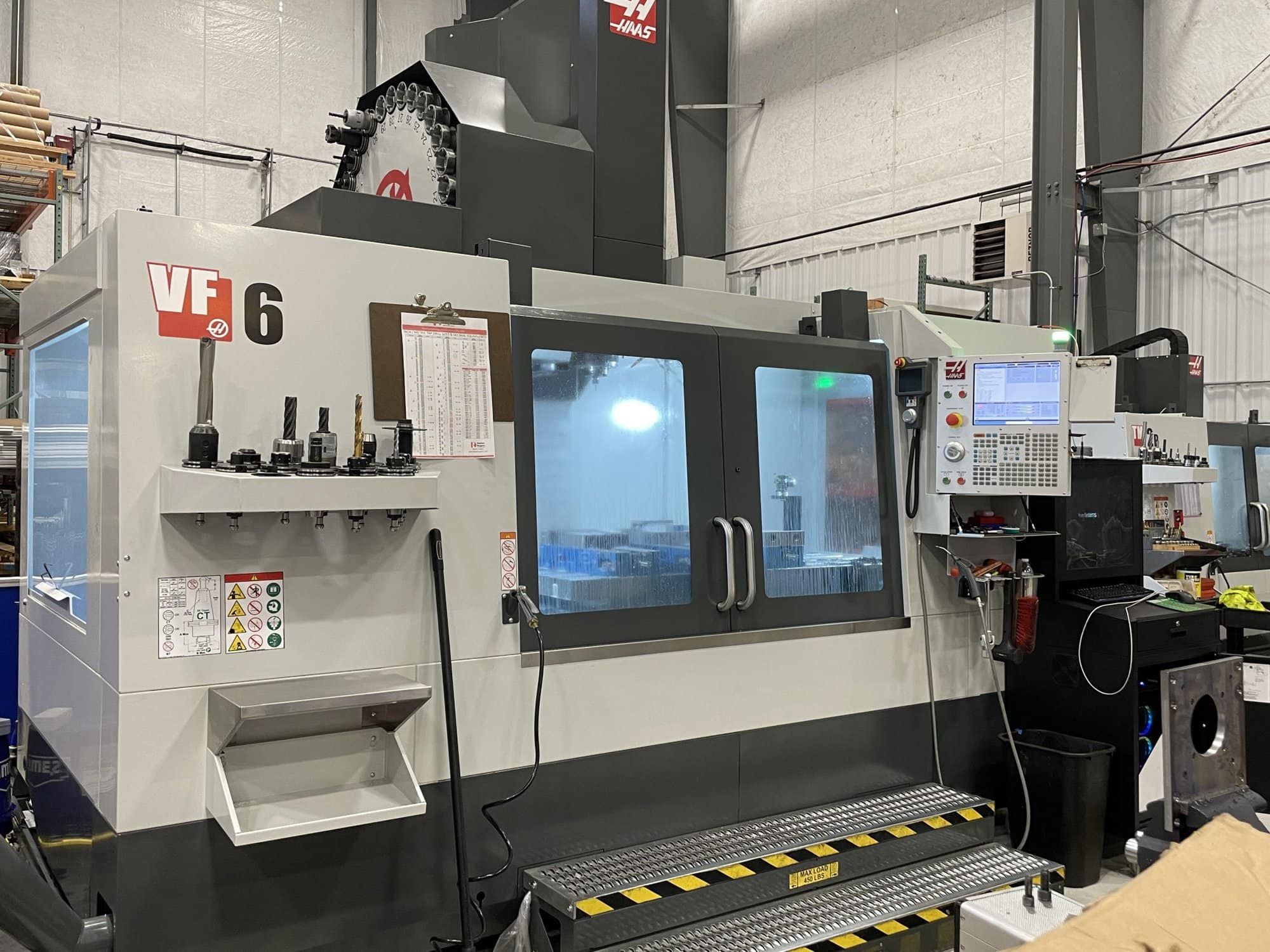 Haas VF-6/50 VMC, 2022-Thru Spindle Coolant,4th Axis, Probe, Auto Air Gun, Auto Door Cabinet