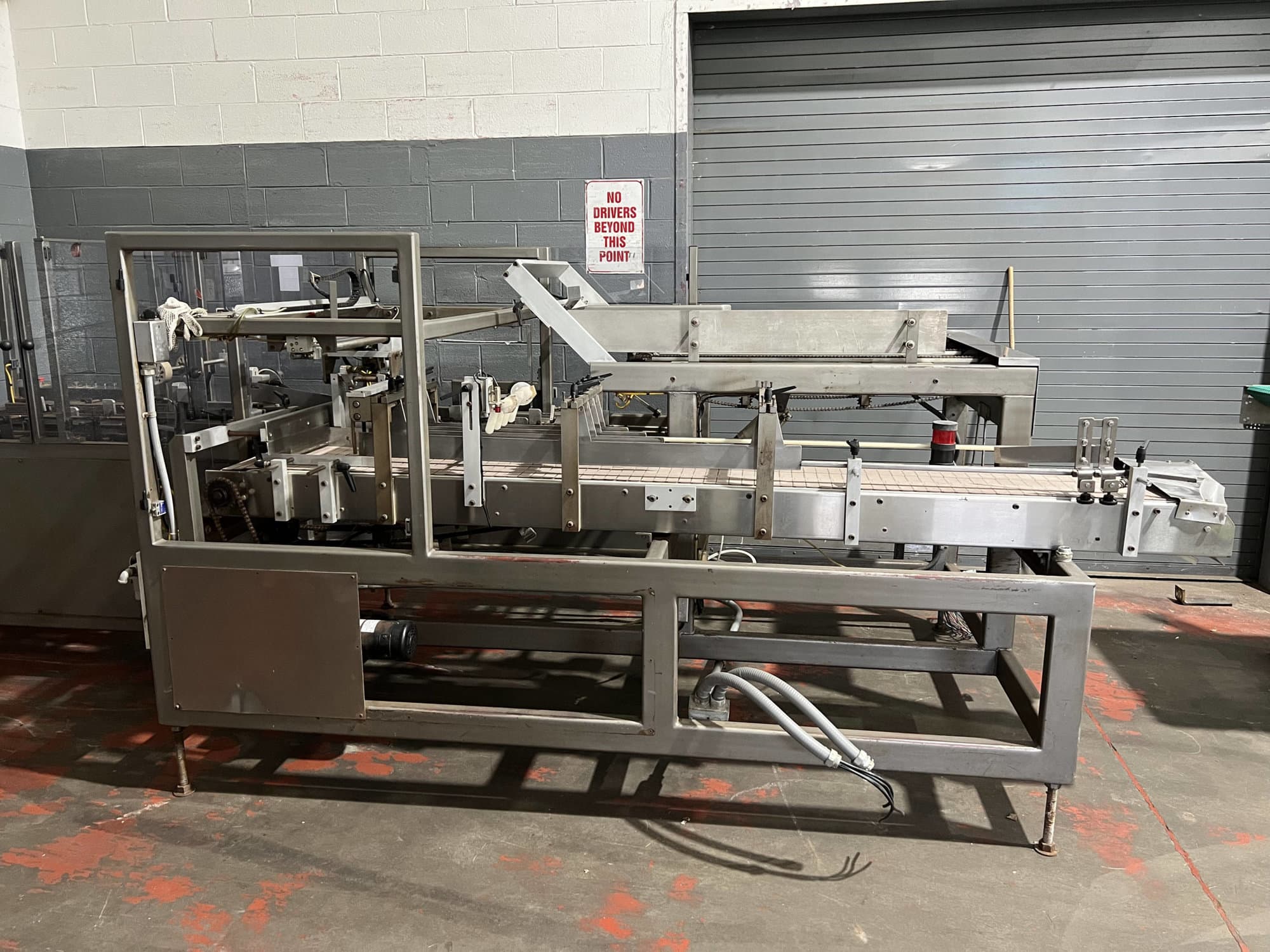Dorell Equipment Side Load Case Packer