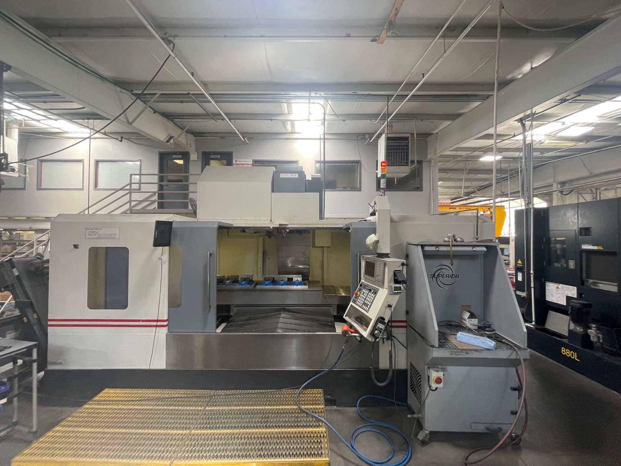 Akira Seiki SV2060 CNC Vertical Machining Center, 2013 - 84.5" x 31.5" Table, 33" Y Axis, W/4th Axis Rotary