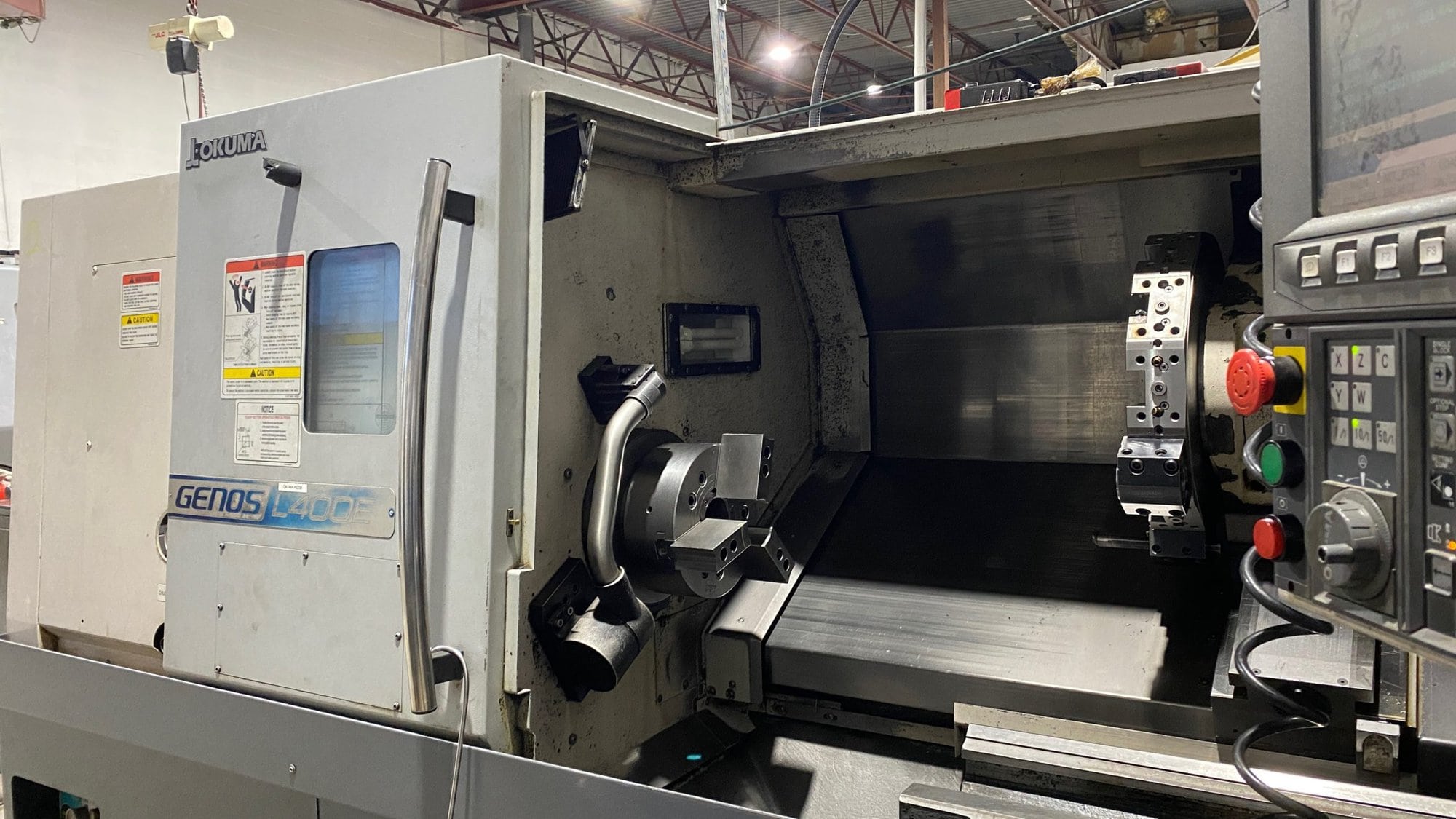 Okuma Genos L400E CNC Lathe, 2012 - Under Power, Chip Conveyor - Image 2