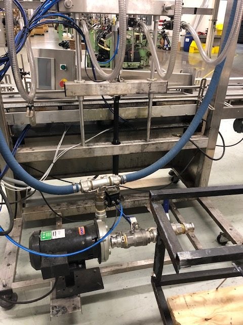 Liquid Packaging Solutions 4 Head Liquid Filling Line, In-feed and Out-feed Conveyor, and rotating collection table. 2017 - Image 2