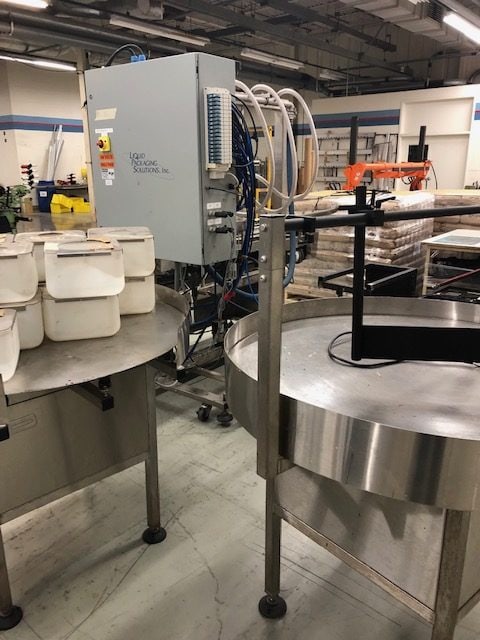 Liquid Packaging Solutions 4 Head Liquid Filling Line, In-feed and Out-feed Conveyor, and rotating collection table. 2017 - Image 3