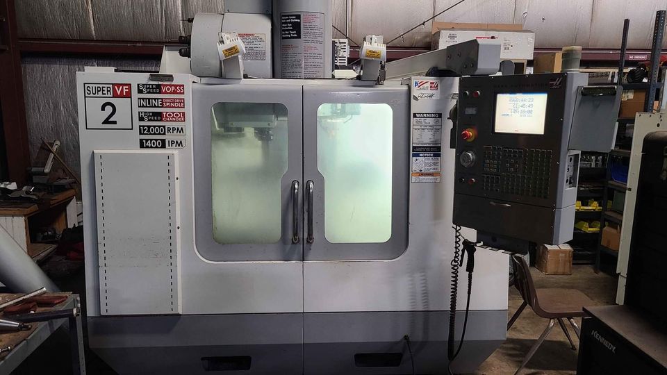 Haas VF-2SS VMC, 2005 - 4th Axis Drive, Auger, 12K Spindle