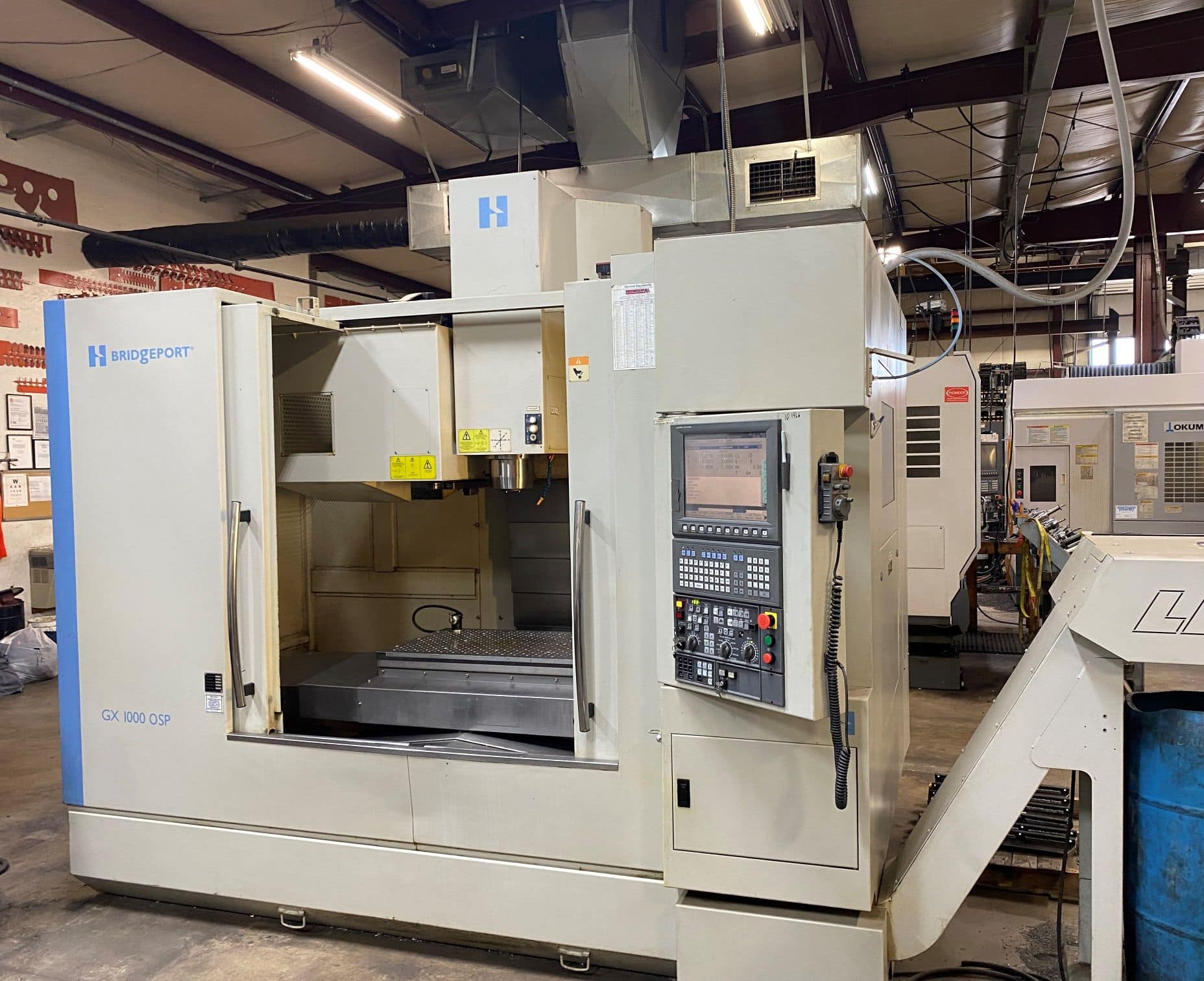 Hardinge GX1000 OSP VMC, 2011 - CTS Ready, Turbo Chip Conveyor, Probe & Okuma Control.