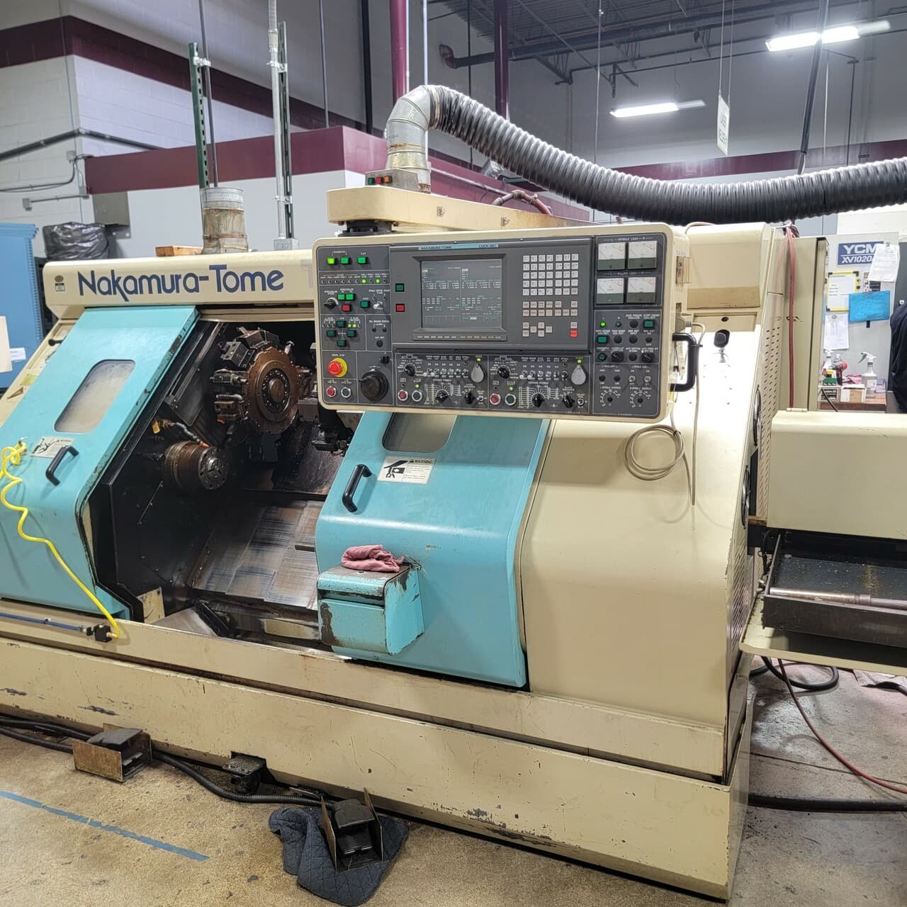 Nakamura Tome TW-10MM CNC Lathe, 1993 - Twin Turret, Bar Feeder, C Axis, Tooling Available