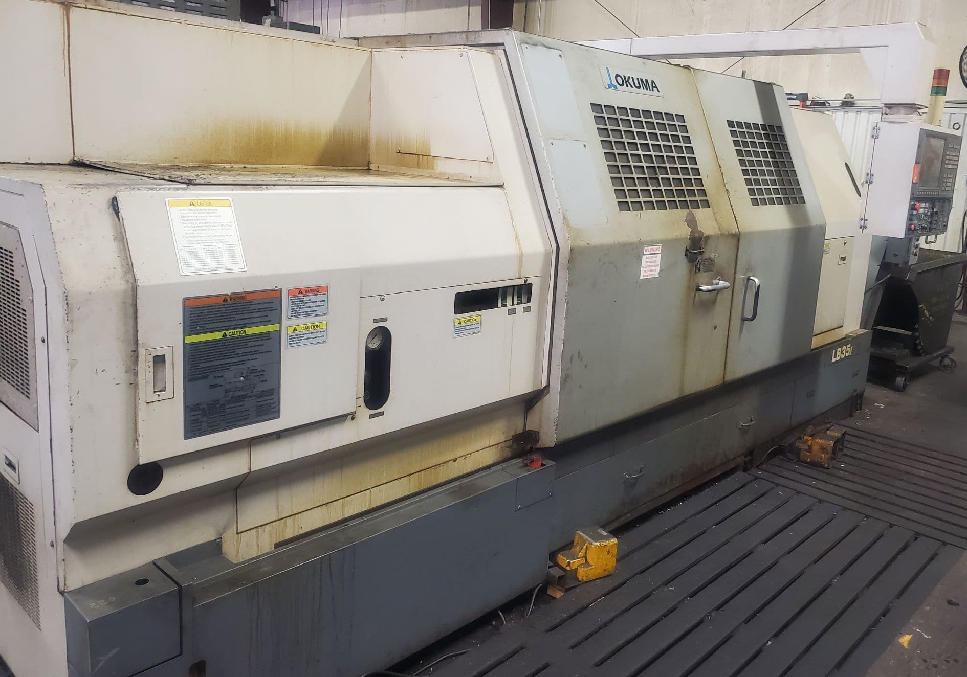 Okuma LB35-II CNC Lathe, 2007 - Chip Conveyor, Steady Rest, Extended Air Chuck