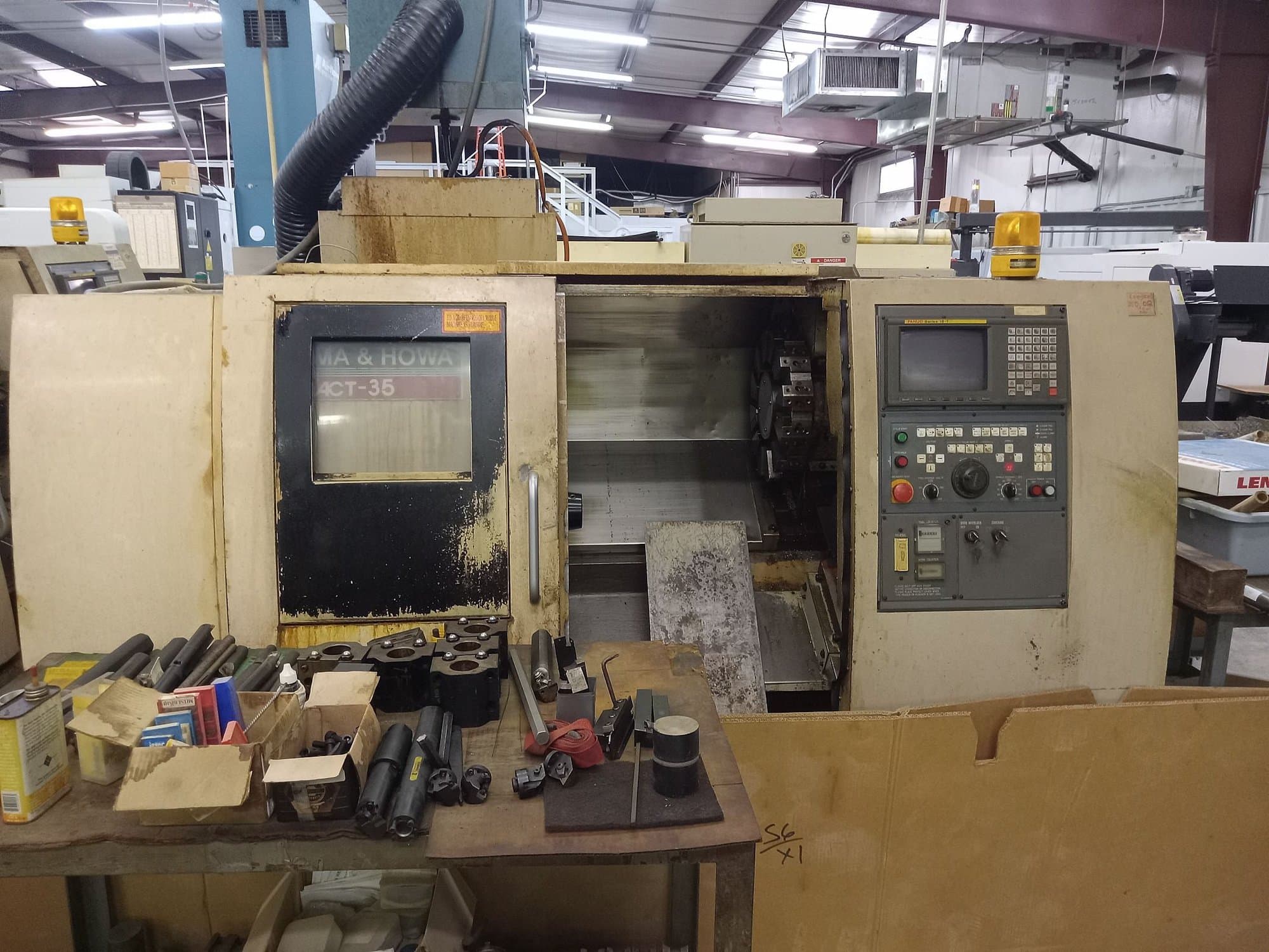 Okuma Howa ACT-35 CNC Lathe, 1997 - Tailstock, Chip Conveyor