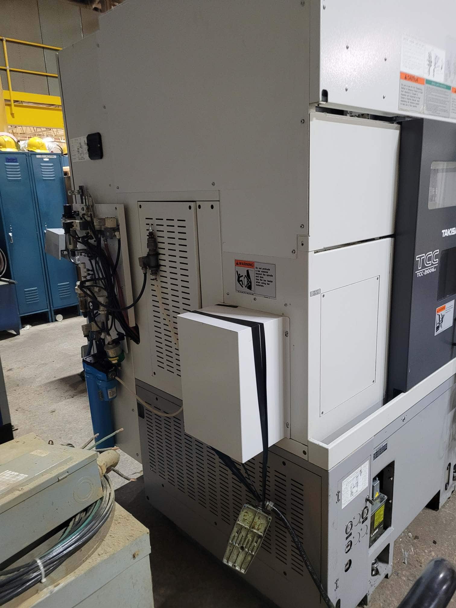 Takisawa TCC-2100G L2 CNC Lathe, 2017 - Fanuc Control, Chip Conveyor, Carousel Feeder - Image 4